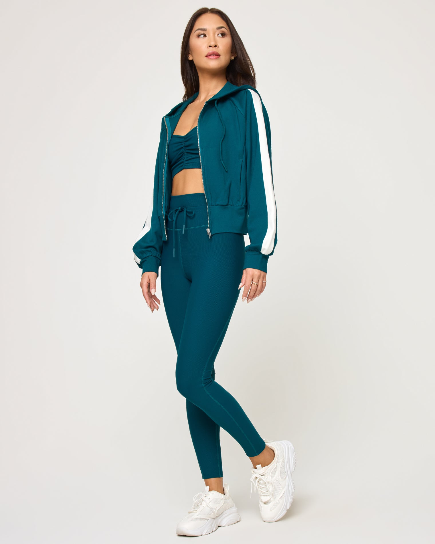 Back To Back Jacket - Deep Teal-Cream Side view of model wearing the Back To Back Jacket in deep teal-cream with matching deep teal-cream Back To Back Pant.