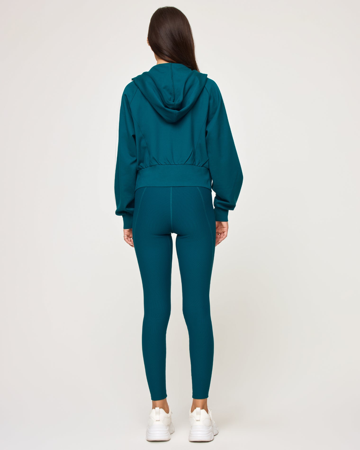 Back To Back Jacket - Deep Teal-Cream Back view of model wearing the Back To Back Jacket in deep teal-cream showing the cream contrast back panel, with matching deep teal-cream Back To Back Pant.