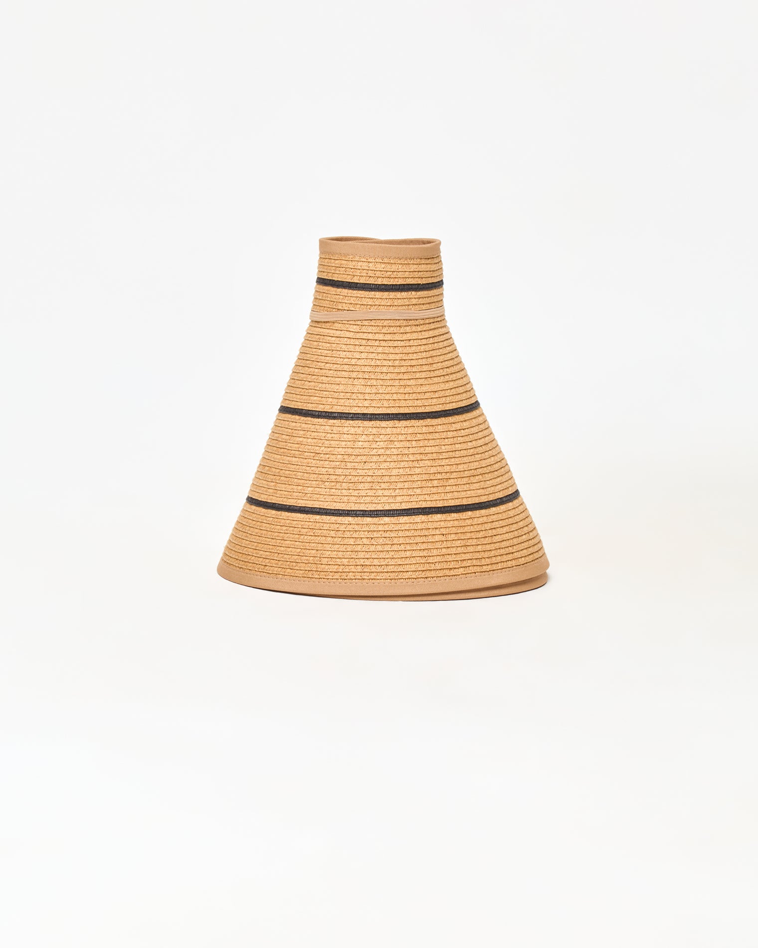 Jess Roll Up Hat - Natural-Black Off-model image of the natural and black Jess Roll Up Hat in its rolled cone shape showing the natural straw with black stripe.