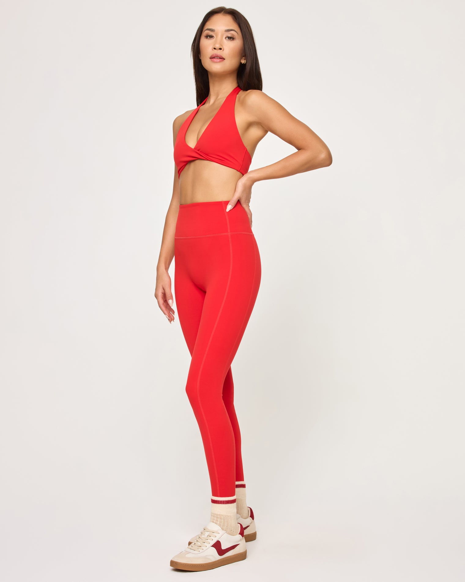 Jeanne Bra - Flame Side view of model wearing the Jeanne Bra in flame with matching flame Level Up Legging.