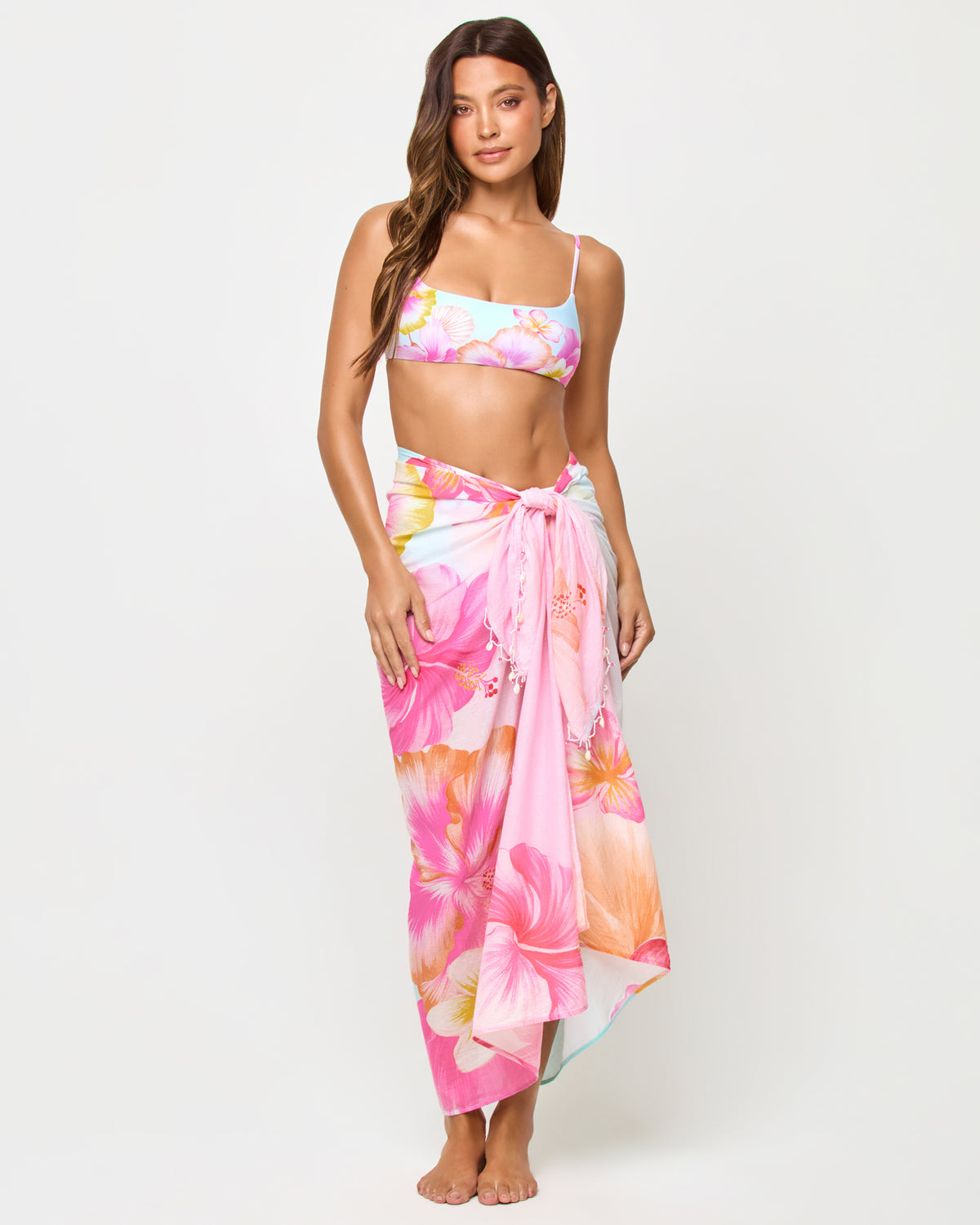 Mika Sarong - Hibiscus And Plumeria Oh My LSPACE Mika Sarong in Hibiscus And Plumeria Oh My print, front view on model tied as maxi wrap.