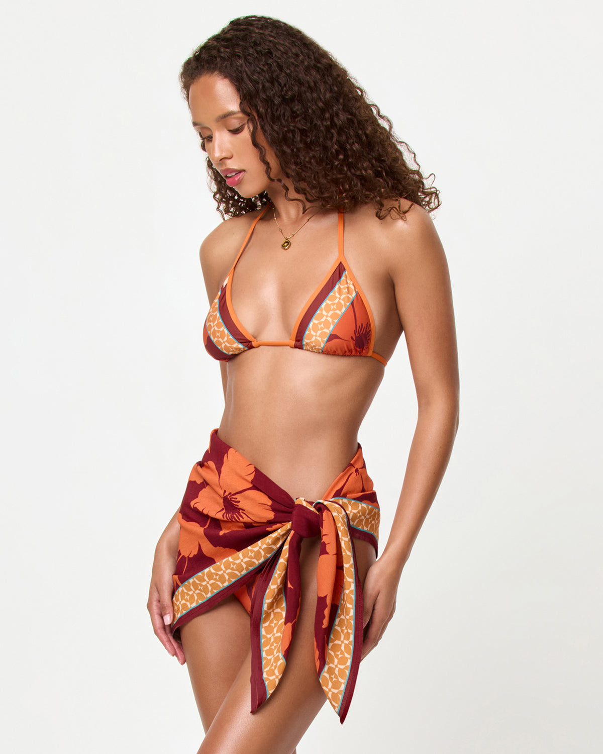 Aspen Bikini Top - Cocobolo LSPACE Momi scarf in Cocobolo print, side view on model, tied in a mini skirt.