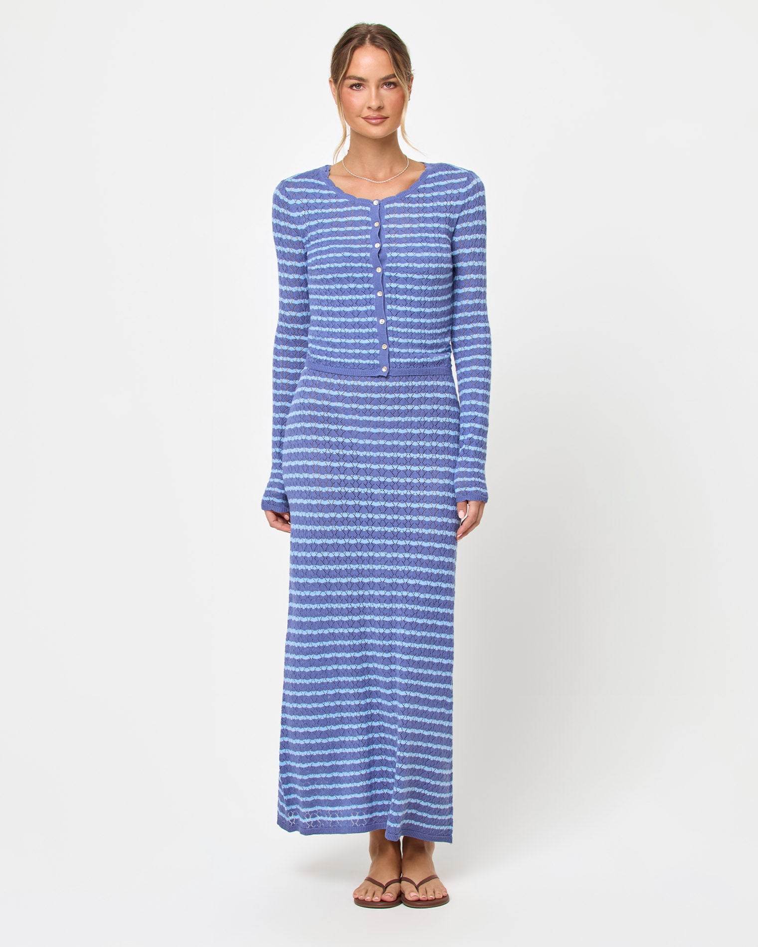 Rosalie Maxi - Blue Lagoon LSPACE Rosalie maxi dress in blue lagoon, styled with cardigan, front view on model.