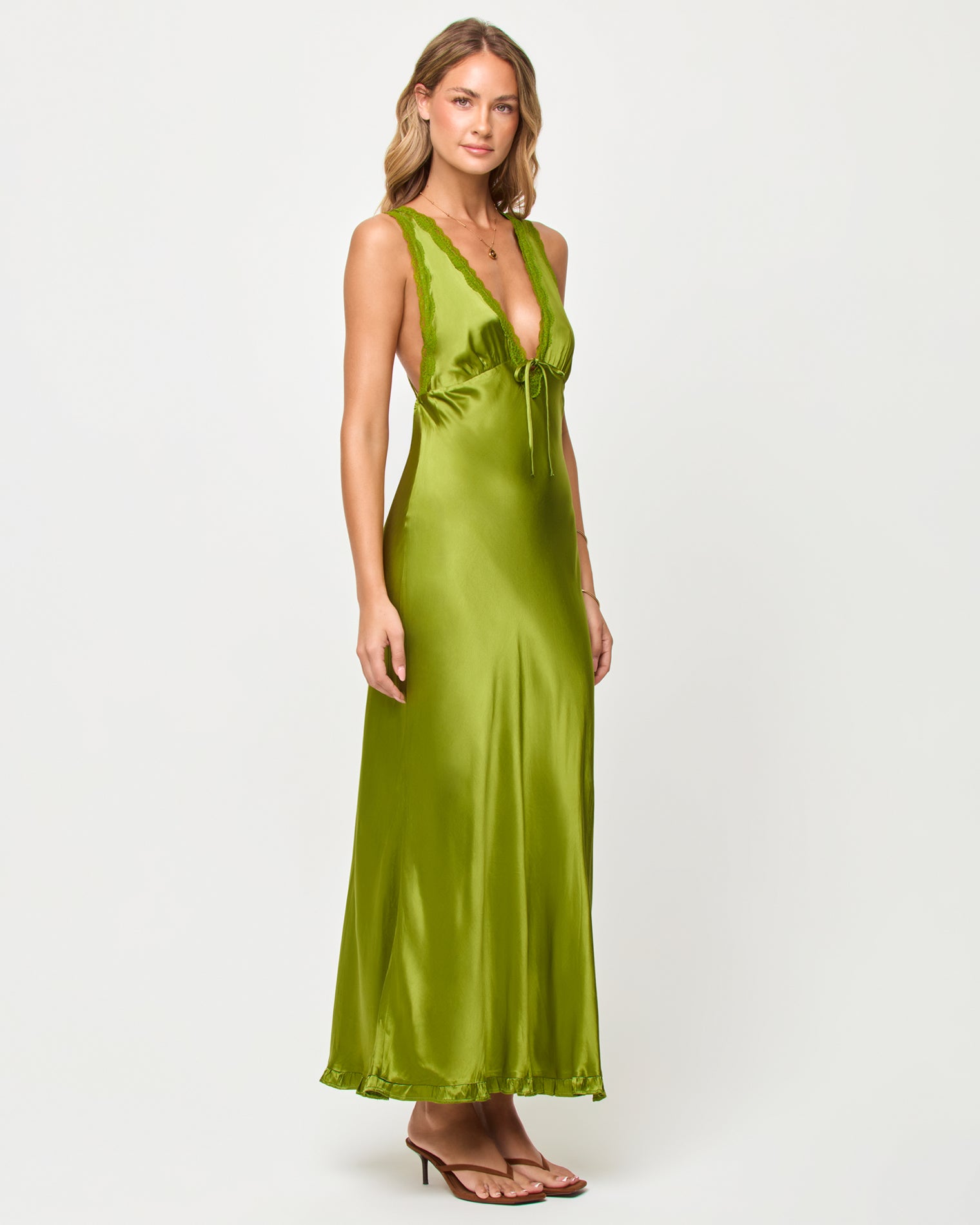 x The Salty Blonde Eyes On You Maxi - Verdant Side view of model wearing the LSPACE x The Salty Blonde Eyes On You Maxi in verdant.