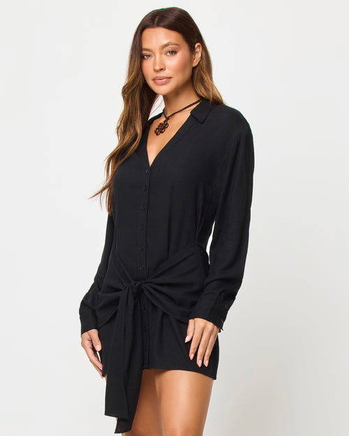 LSPACE Vera mini dress in black, three-quarter view on model.