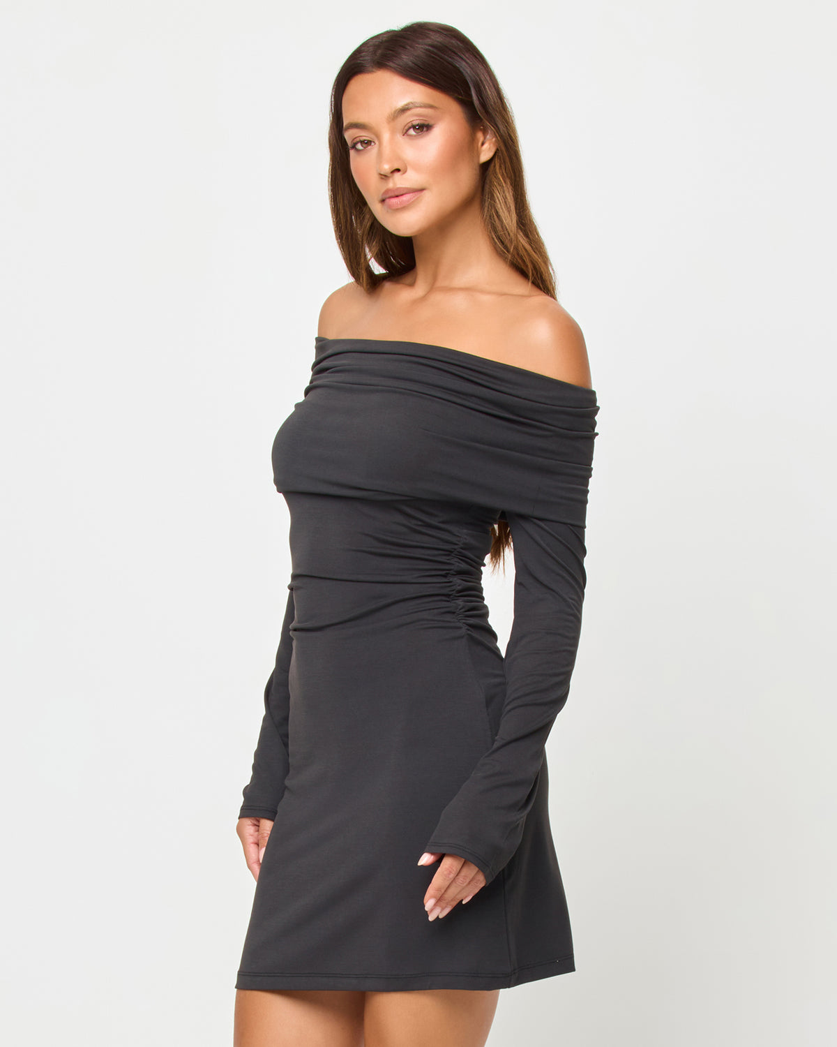 Melinda Mini - Black LSPACE Melinda Mini dress in black, three-quarter view on model.