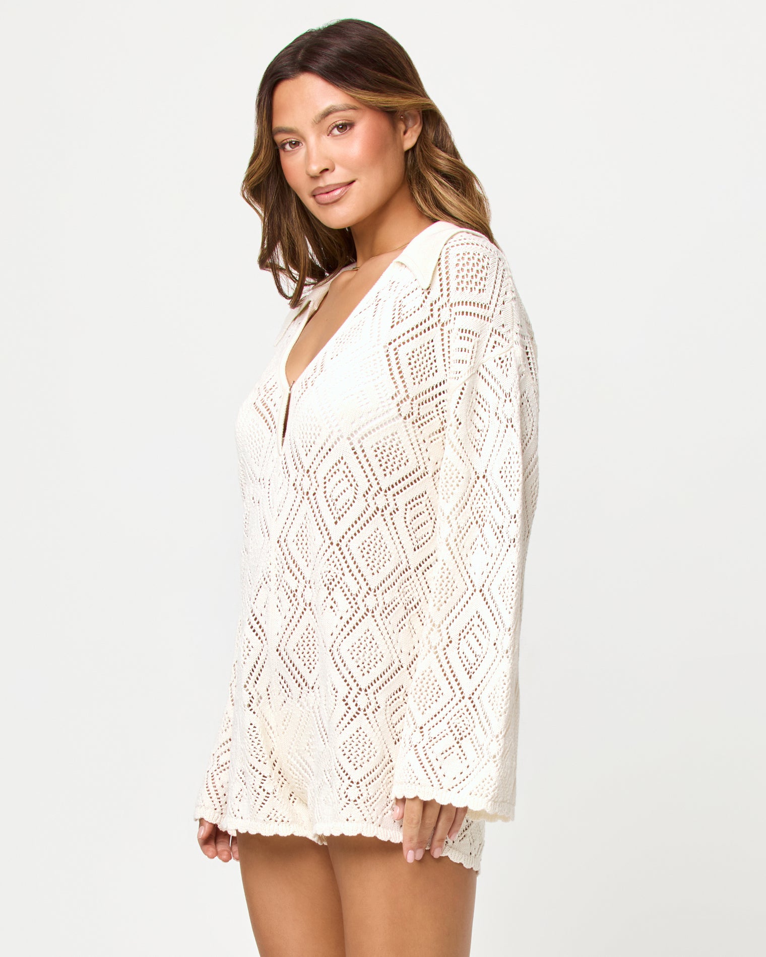x The Salty Blonde Golden Daze Romper - Cream Side view of model wearing the LSPACE x The Salty Blonde Golden Daze Romper in cream.