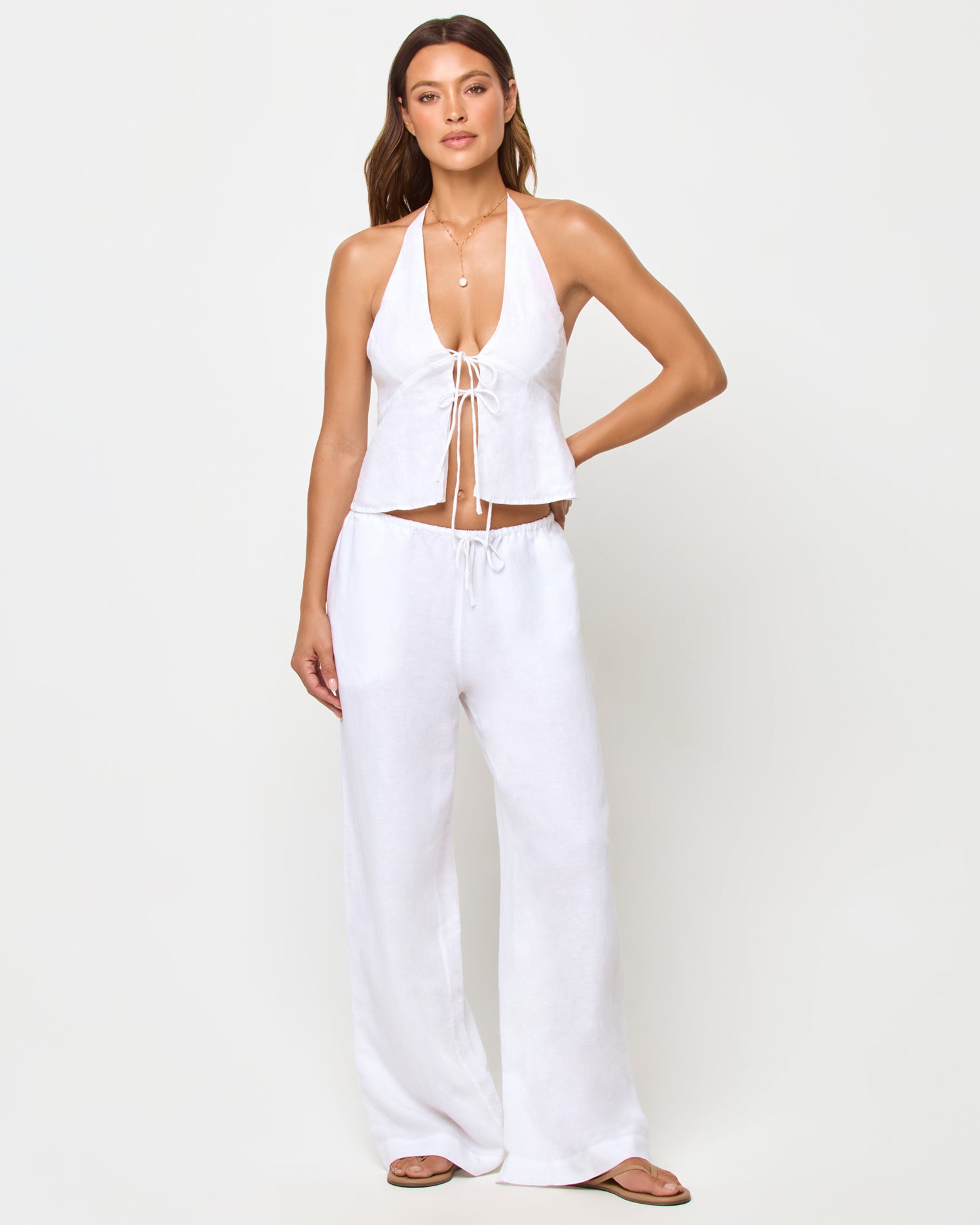 Nina Pant - White LSPACE Nina Pant in white with halter crop top, front view on model.