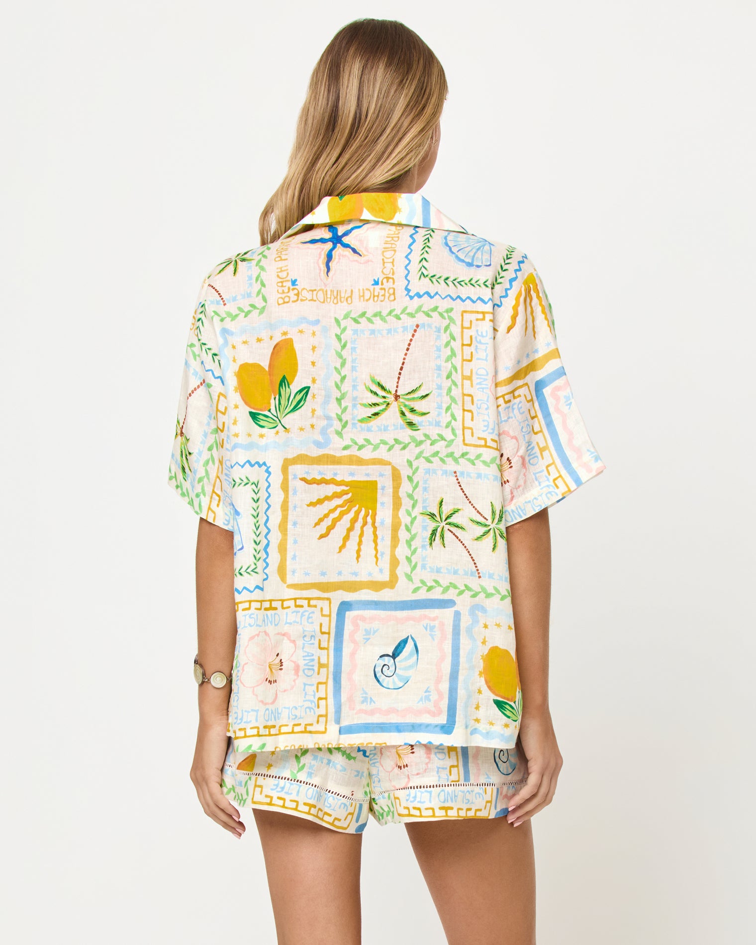La Mer Shirt - Wish You Were Here LSPACE La Mer Short and Shirt in Wish You Were Here print, back view on model.