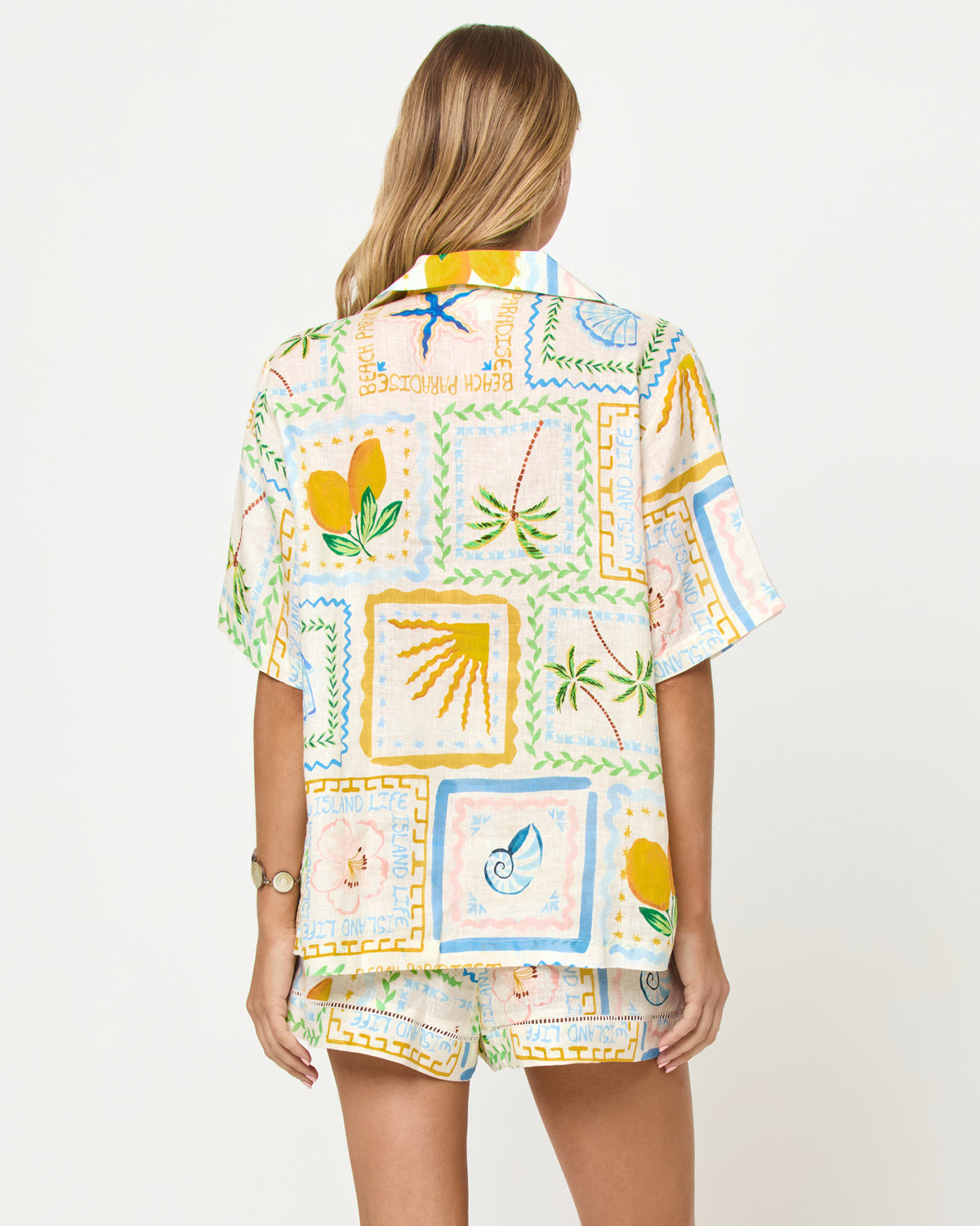 La Mer Shirt - Wish You Were Here LSPACE La Mer Short and Shirt in Wish You Were Here print, back view on model.