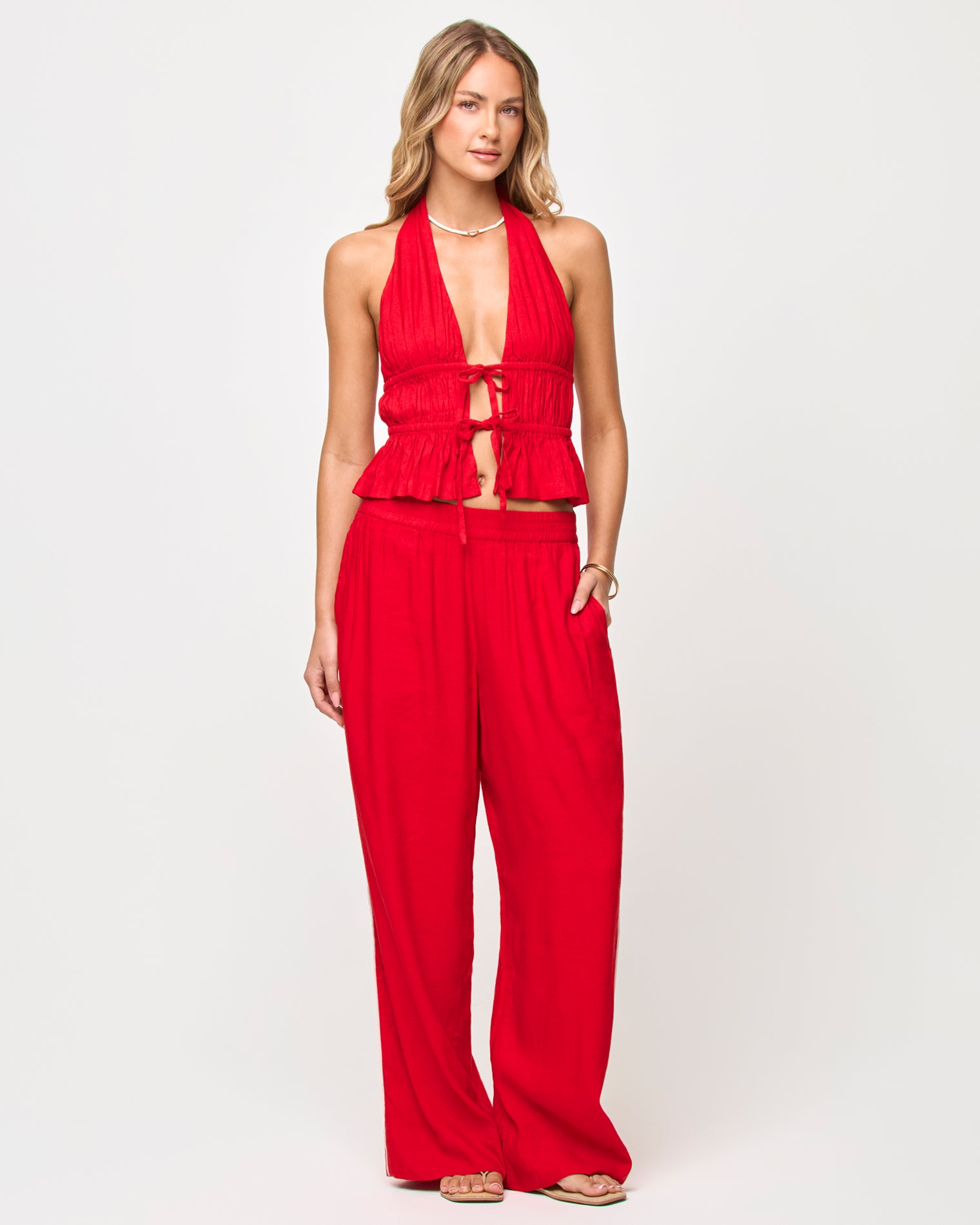 x The Salty Blonde August Top - Flame Front view of model wearing the LSPACE x The Salty Blonde August Top in flame, a cropped top in a warm orange-red tone.