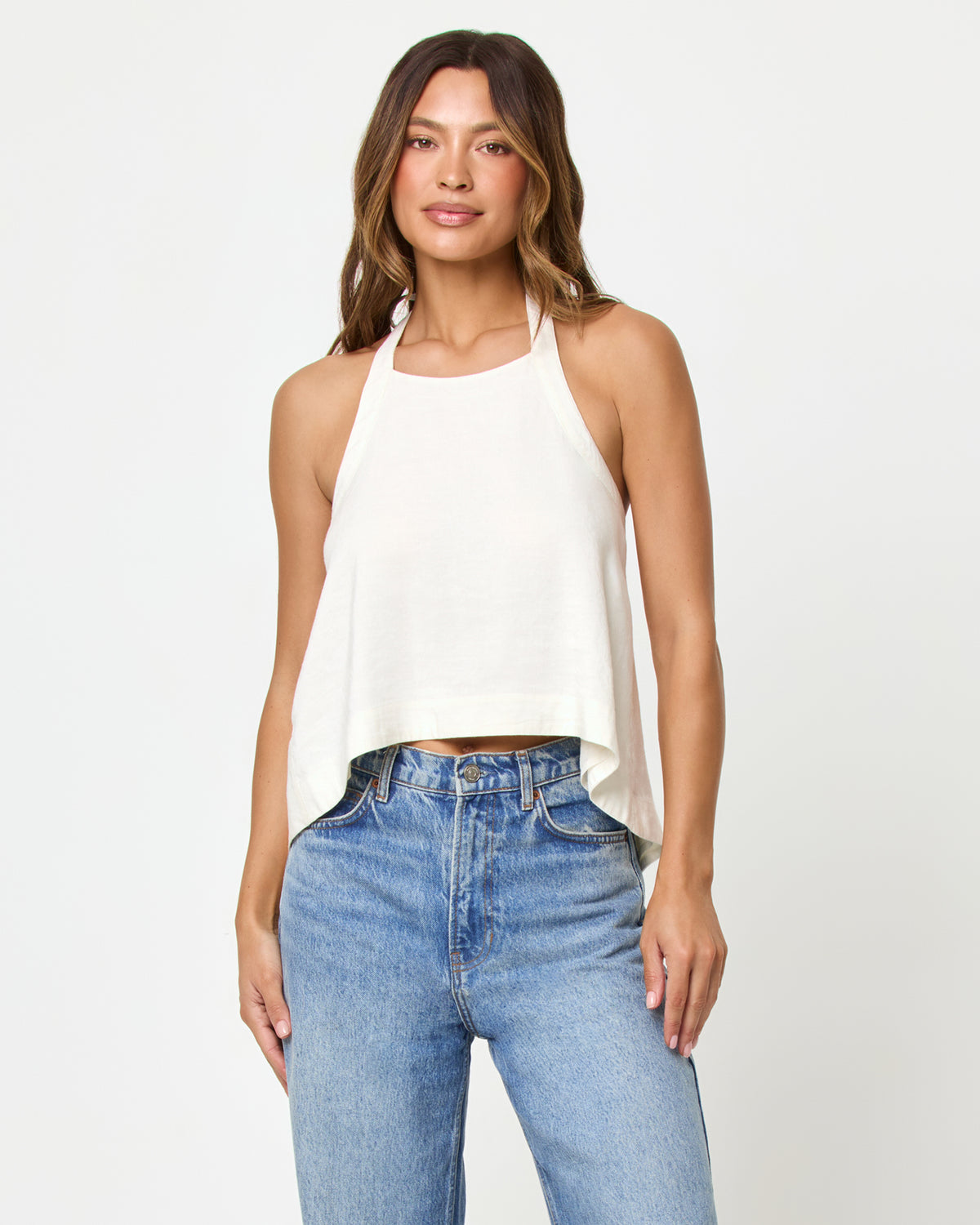 Milly Top - Cream LSPACE Milly top in cream, styled with jeans, front view on model.