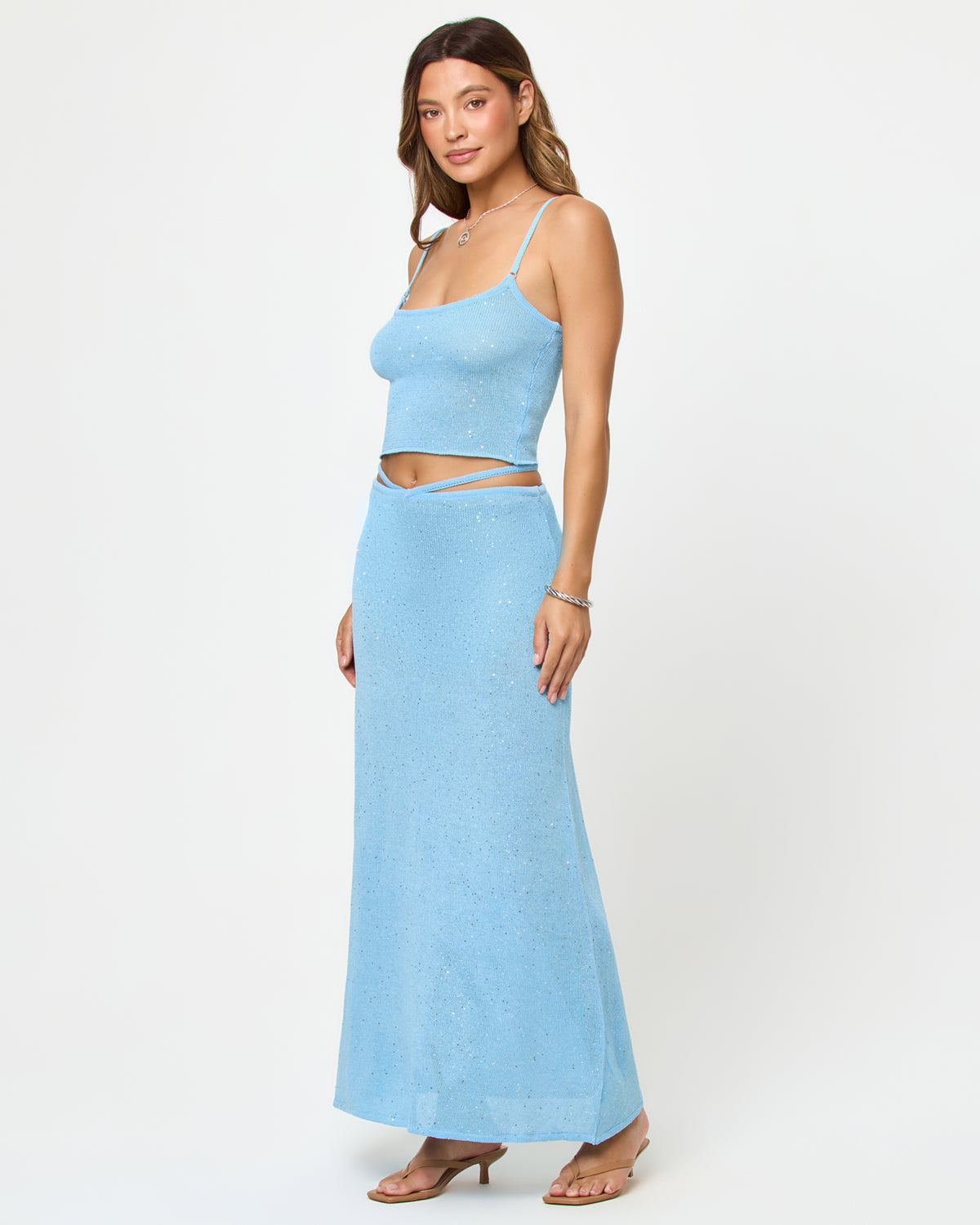 Last Light Skirt - Sky Blue LSPACE Last Light Top and Skirt in Sky Blue, three-quarter view on model.