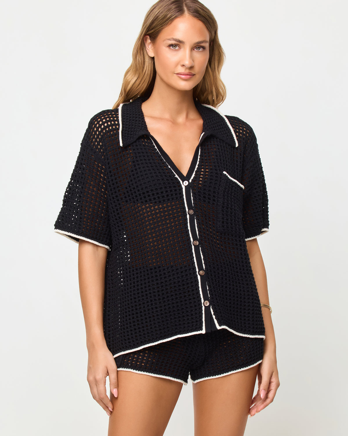 Scout Short - Black-Cream LSPACE Scout short in Black-Cream, front view on model.