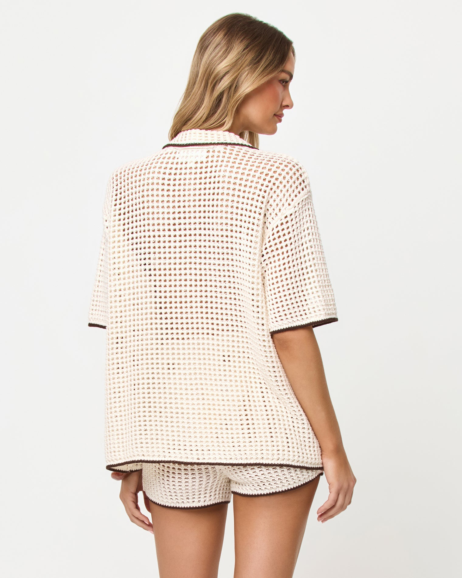 x The Salty Blonde Scout Shirt - Cream-Espresso Back view of model wearing the LSPACE x The Salty Blonde Scout Shirt in cream-espresso, an oversized button-front shirt.