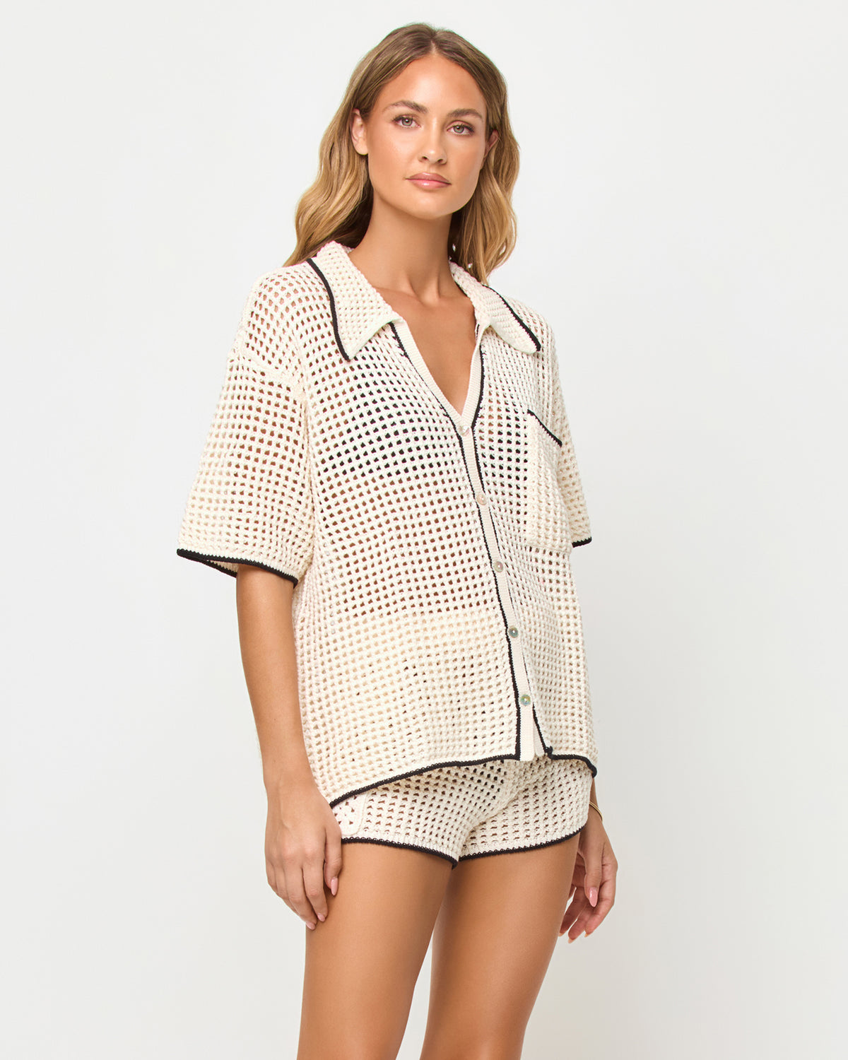 Scout Short - Cream-Black LSPACE Scout short in Cream-Black, front view on model.