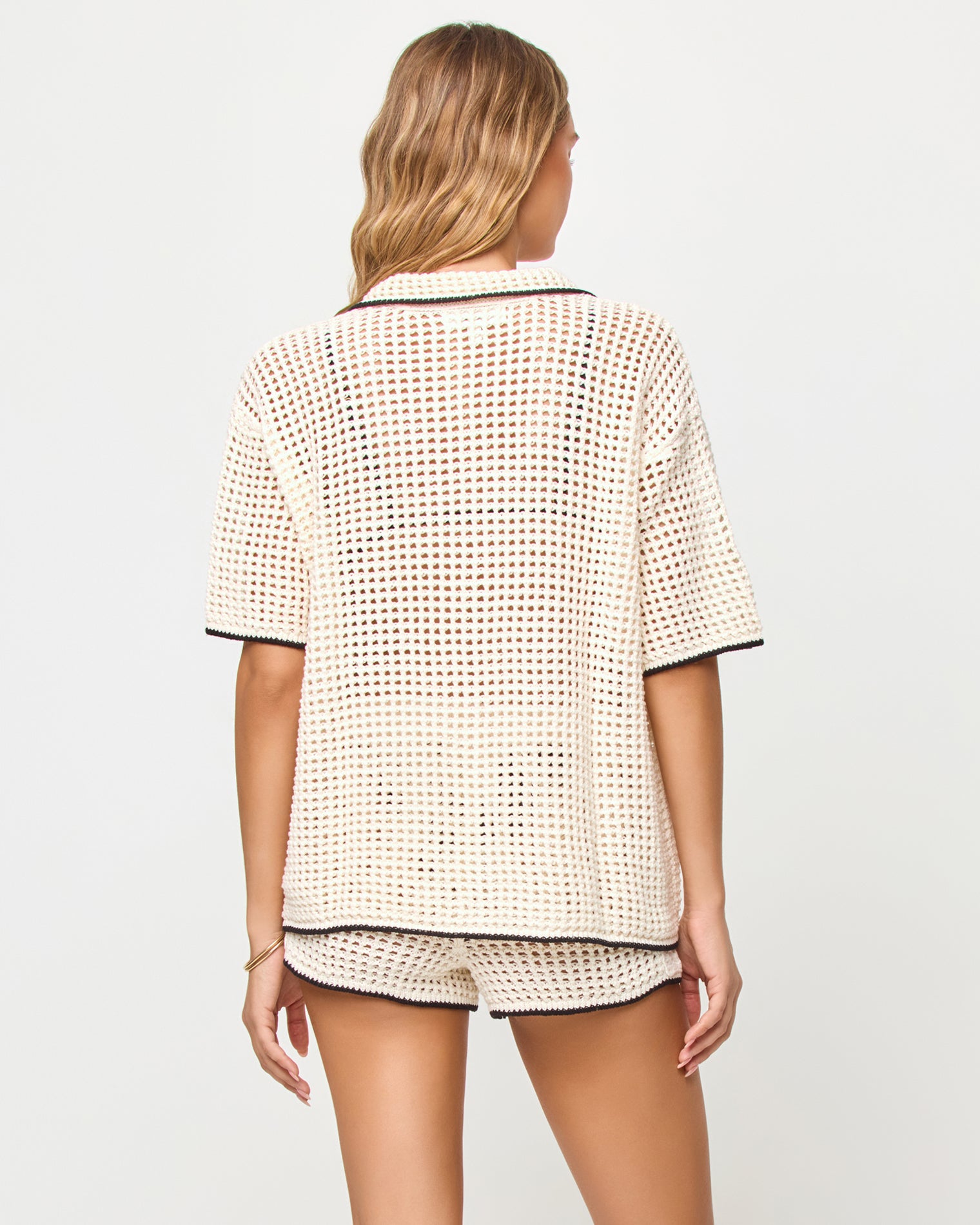 Scout Short - Cream-Black LSPACE Scout short in Cream-Black, back view on model.