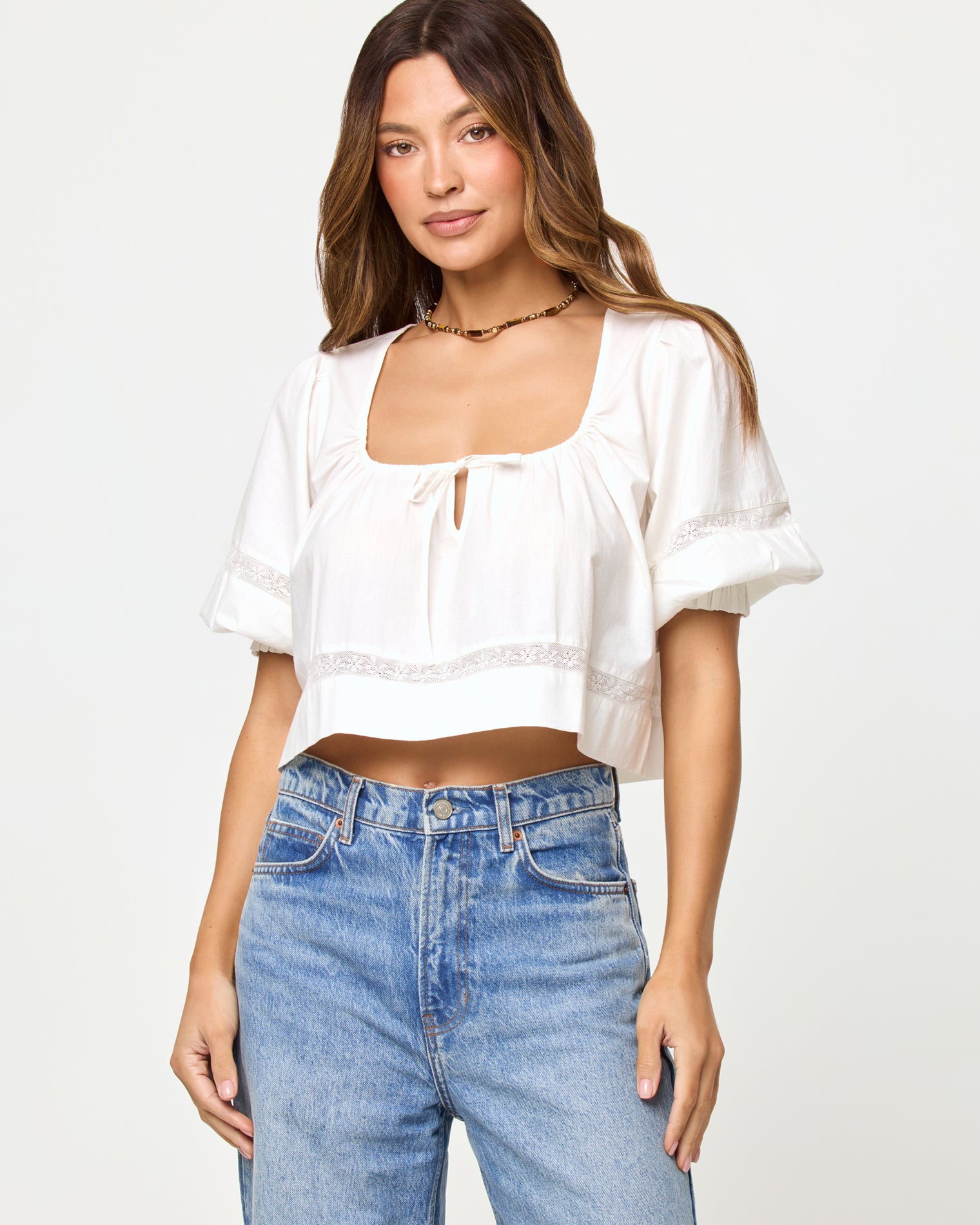 Lucie Top - Cream LSPACE Lucie top in Cream, close-up front view on model.