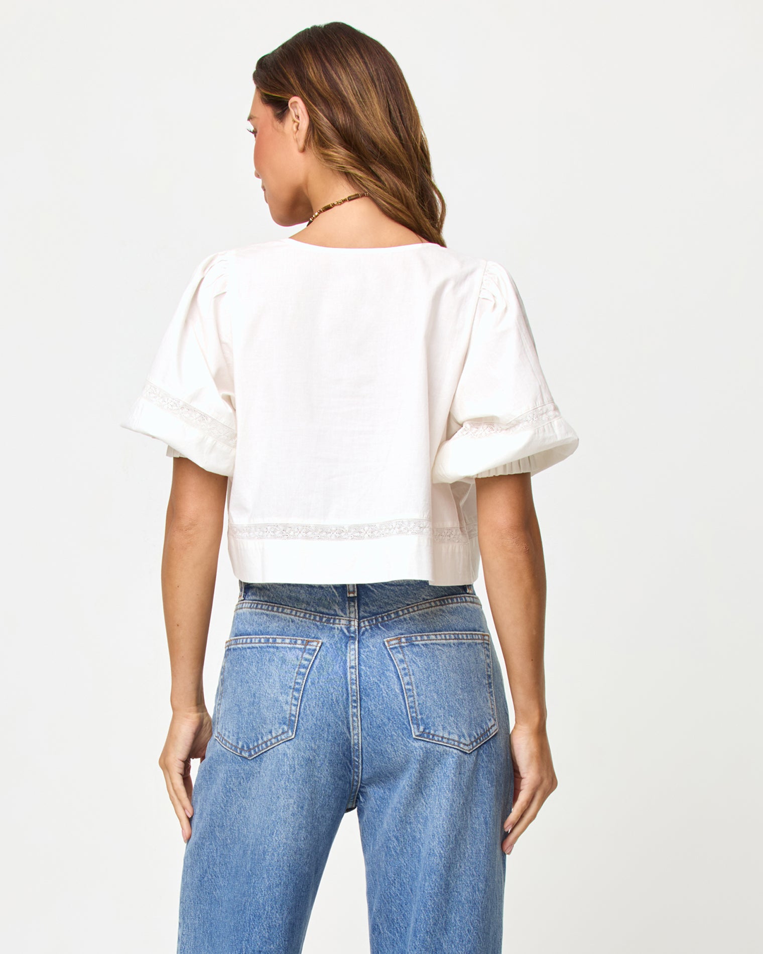 Lucie Top - Cream LSPACE Lucie top in Cream, back view on model.