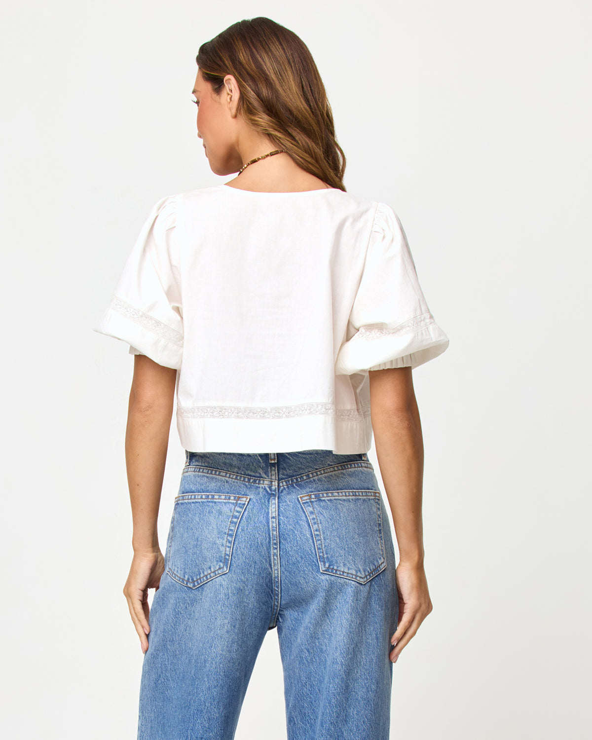 Lucie Top - Cream LSPACE Lucie top in Cream, back view on model.