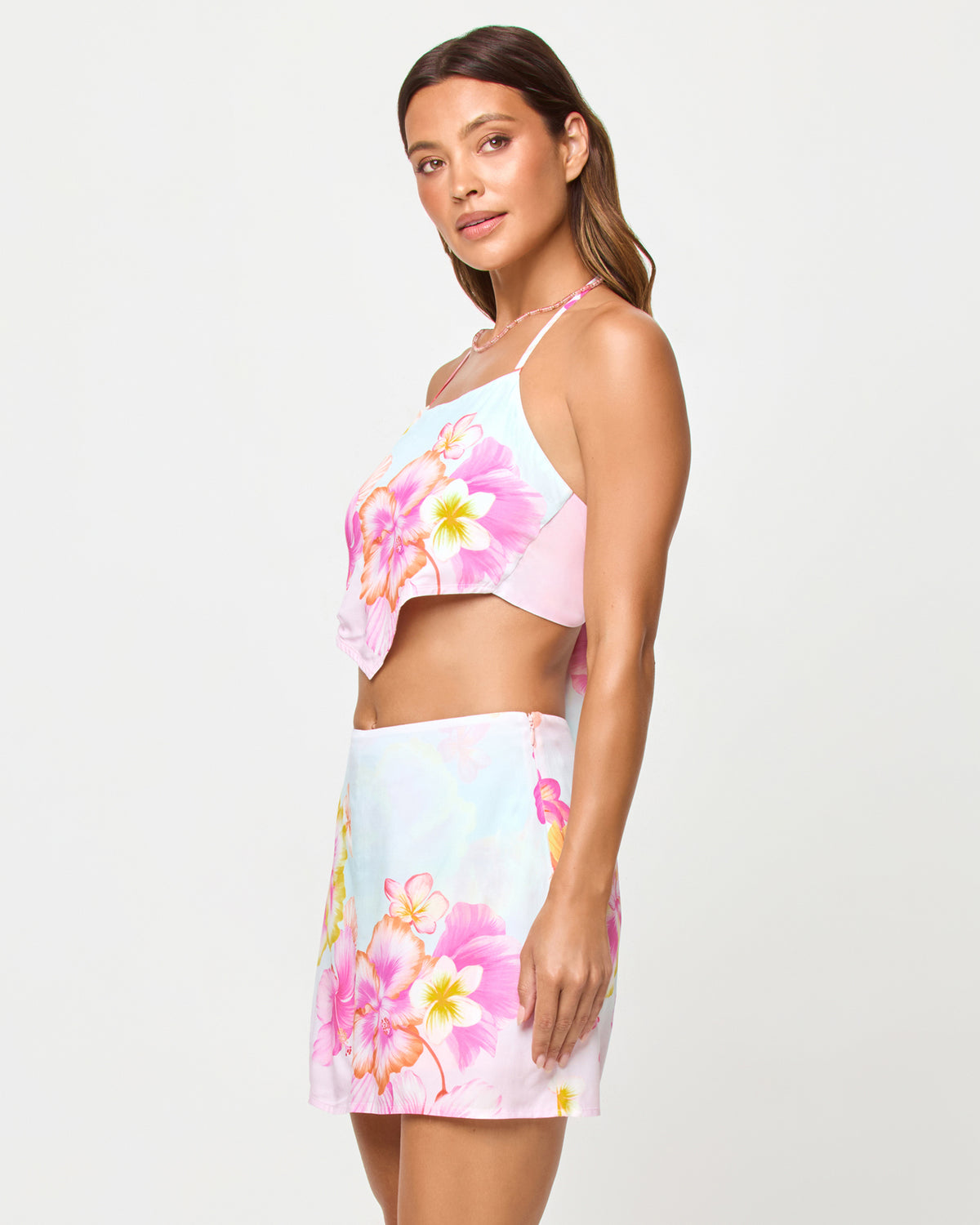 Venice Skort - Hibiscus And Plumeria Oh My LSPACE Maia top in Hibiscus And Plumeria Oh My print, three-quarter view on model.
