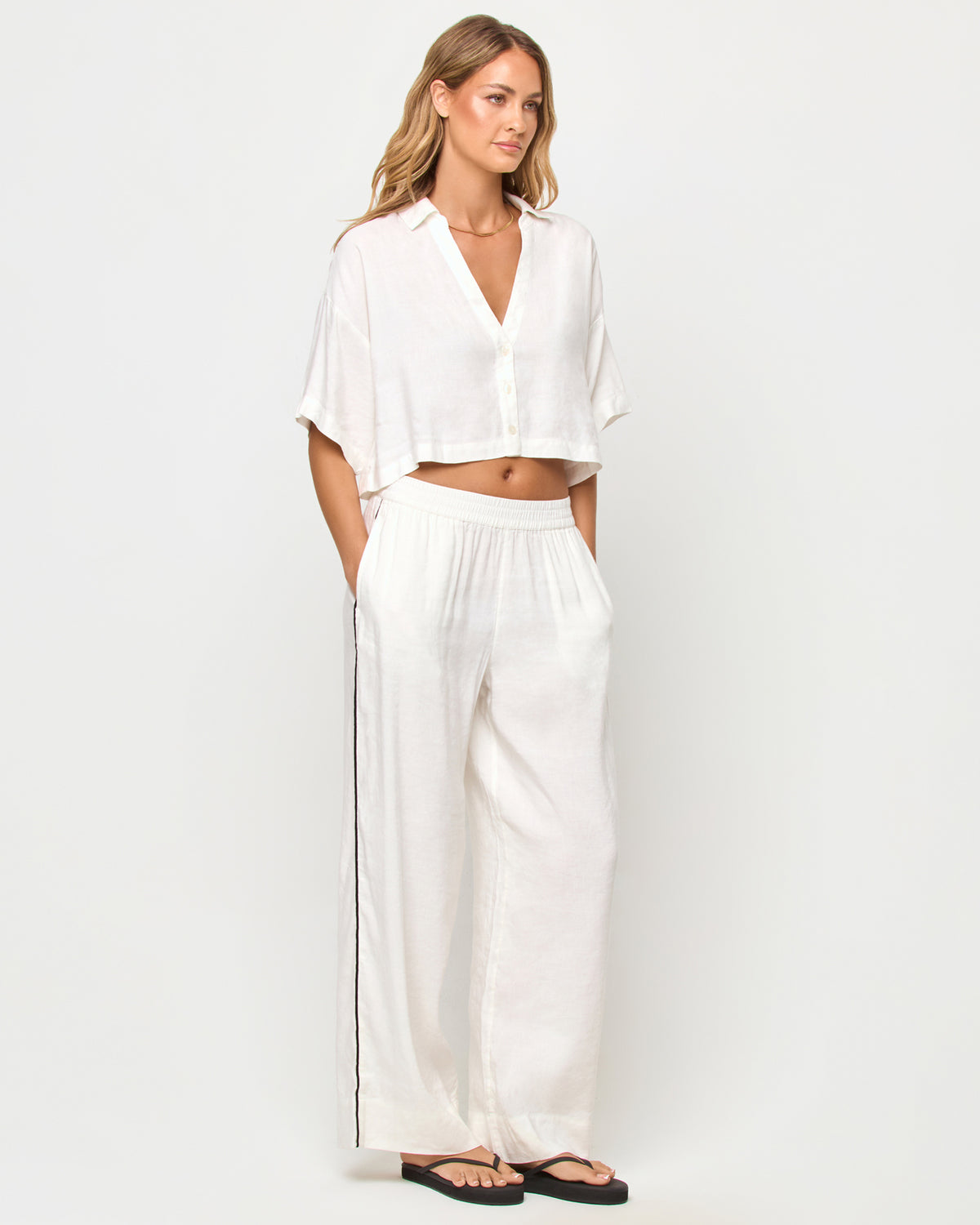 Kitt Top - Cream LSPACE Kitt top in Cream, three-quarter view on model.