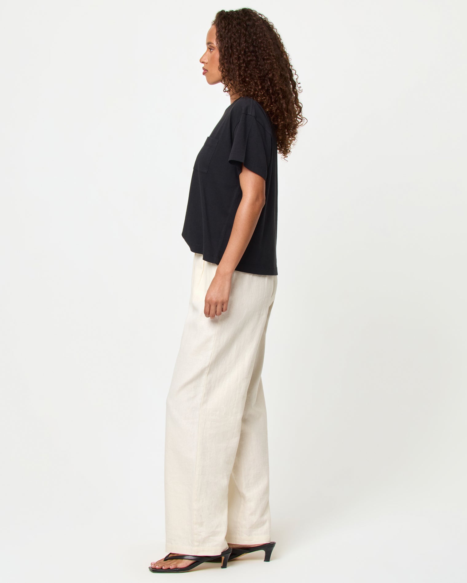 Everyday Tee - Black LSPACE Everyday tee in black, side view on model.