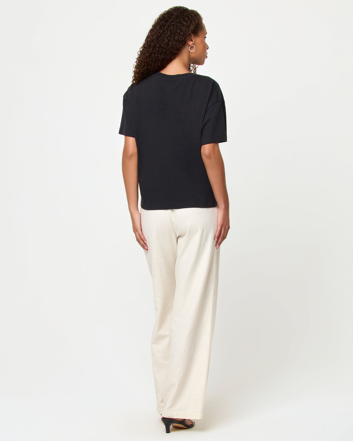 Everyday Tee - Black LSPACE Everyday tee in black, back view on model.