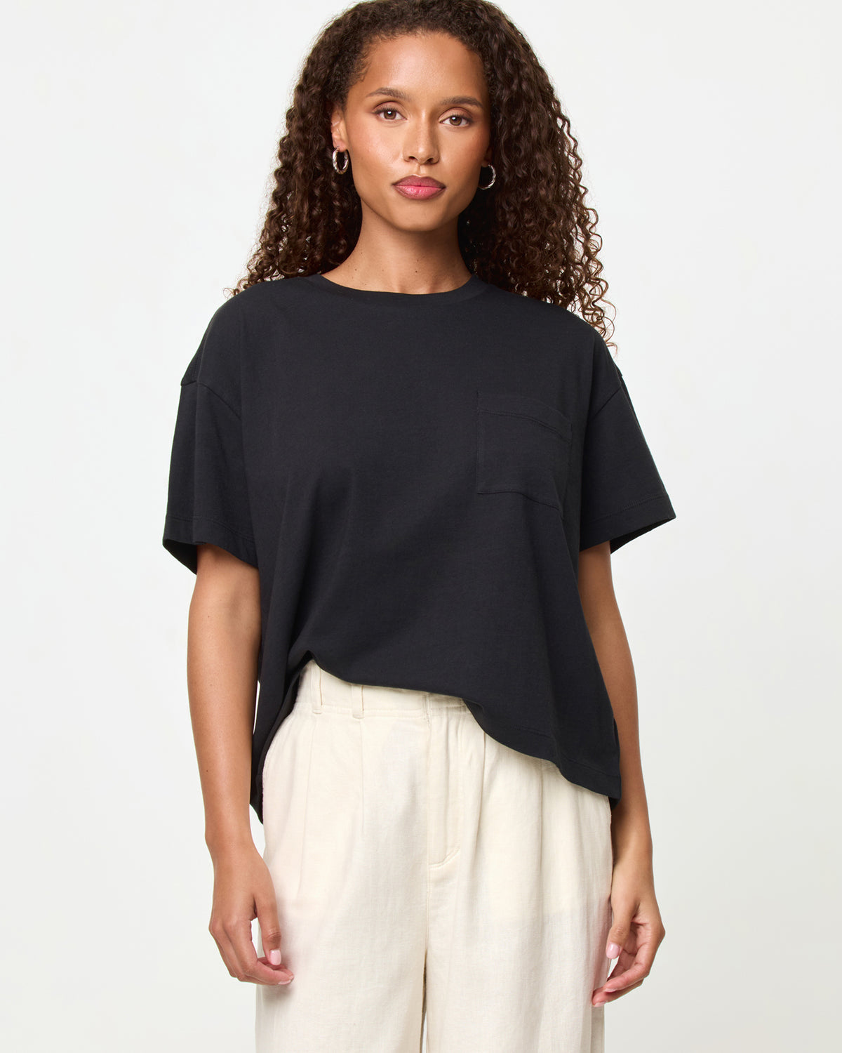 Everyday Tee - Black LSPACE Everyday tee in black, close-up detail view on model.