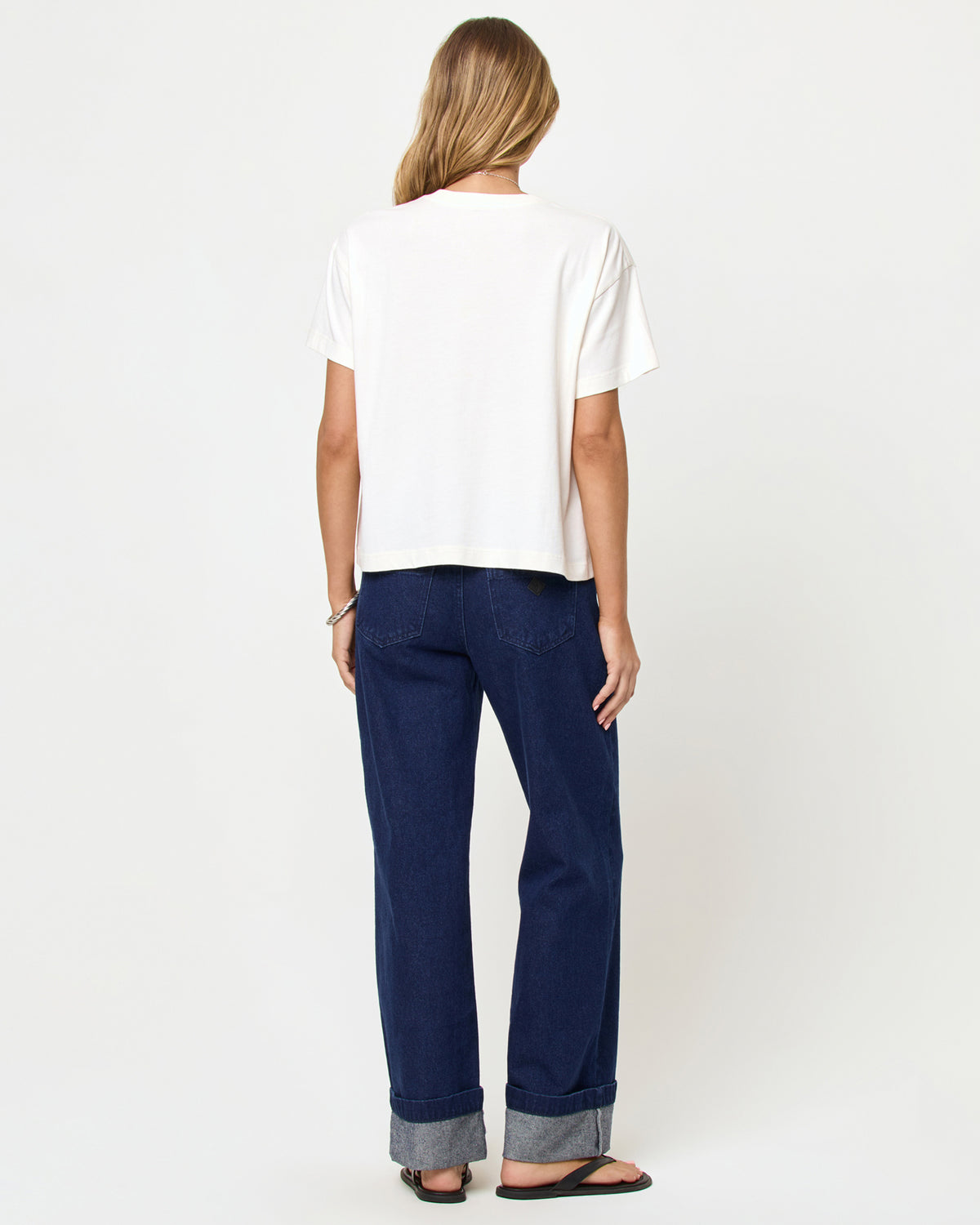Everyday Tee - Cream LSPACE Everyday tee in cream, back view on model.