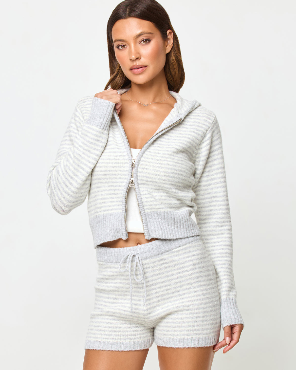 Emery Short - Warm Gray-Cream LSPACE Emery short in Warm Gray-Cream, close-up detail view on model.