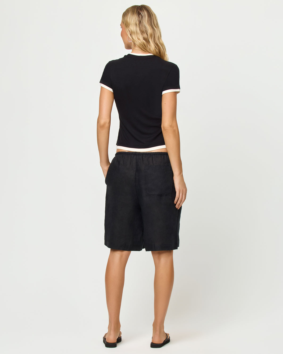 Range Top - Black-Cream Full body, back view of model wearing the Range Top in Black and Cream