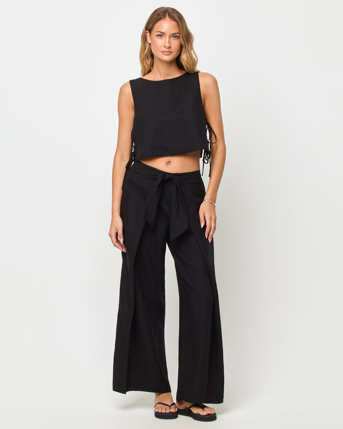 Rylee Pant - Black LSPACE Rylee top in black, front view on model.