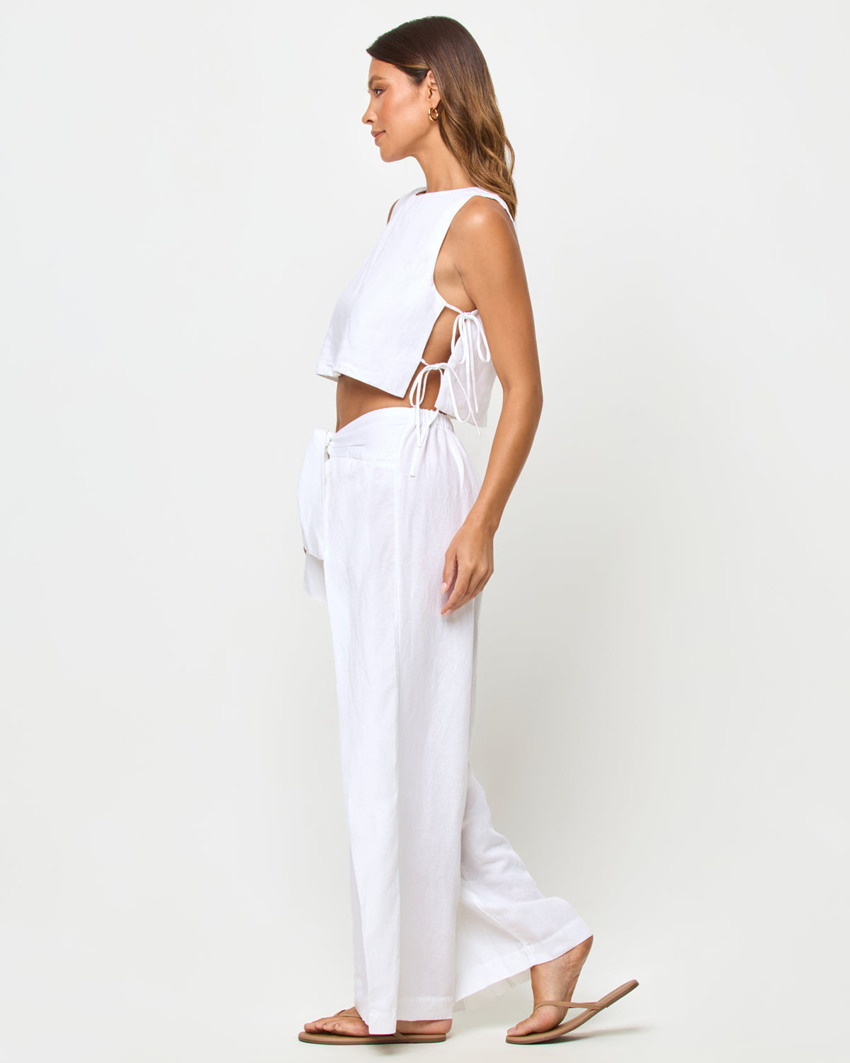 Rylee Top - White LSPACE Rylee pant in white, side view on model.
