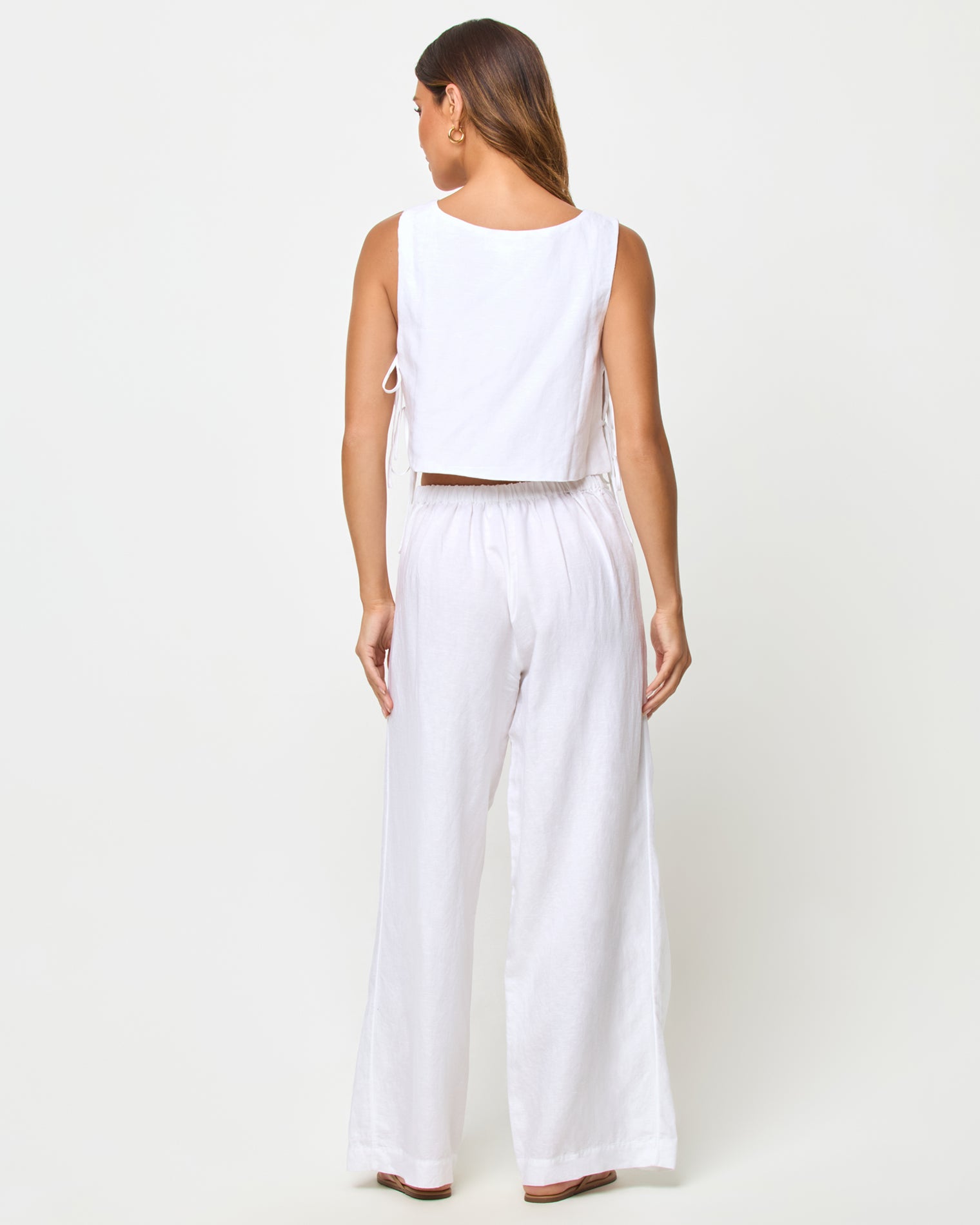 Rylee Top - White LSPACE Rylee pant in white, back view on model.