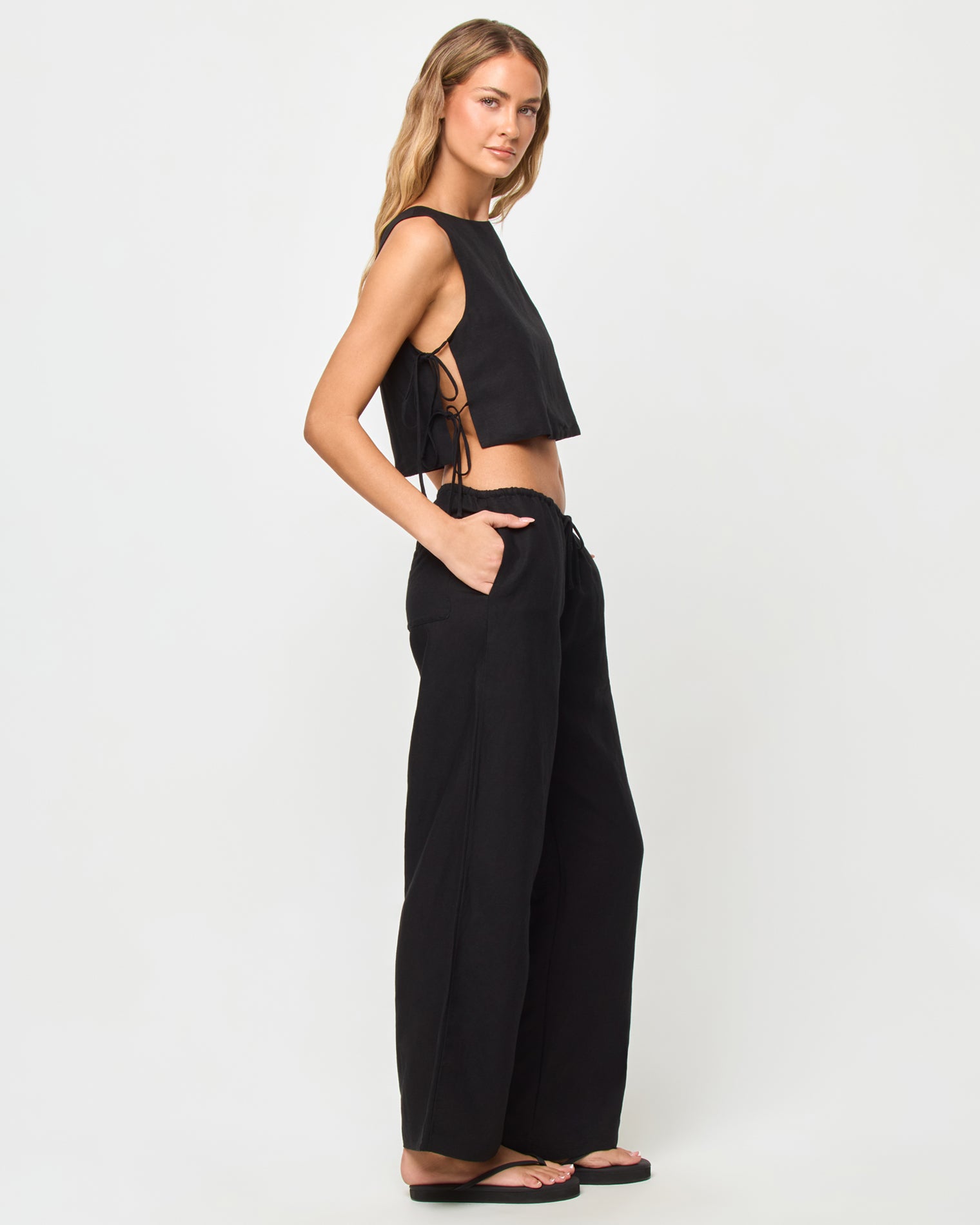 Nina Pant - Black LSPACE Nina Pant in black, three-quarter view on model.