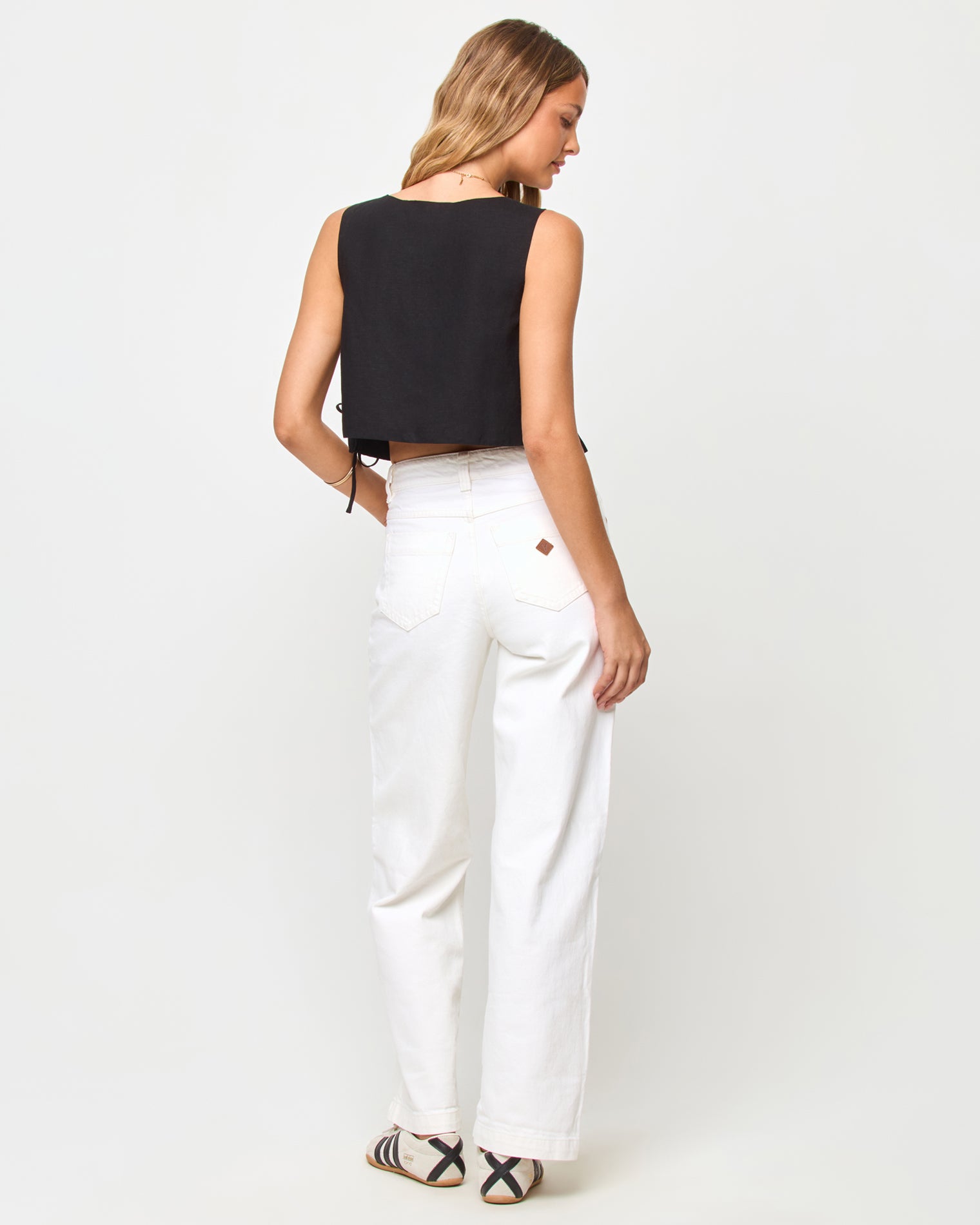 Rylee Top - Black LSPACE Rylee top in black, back view on model.