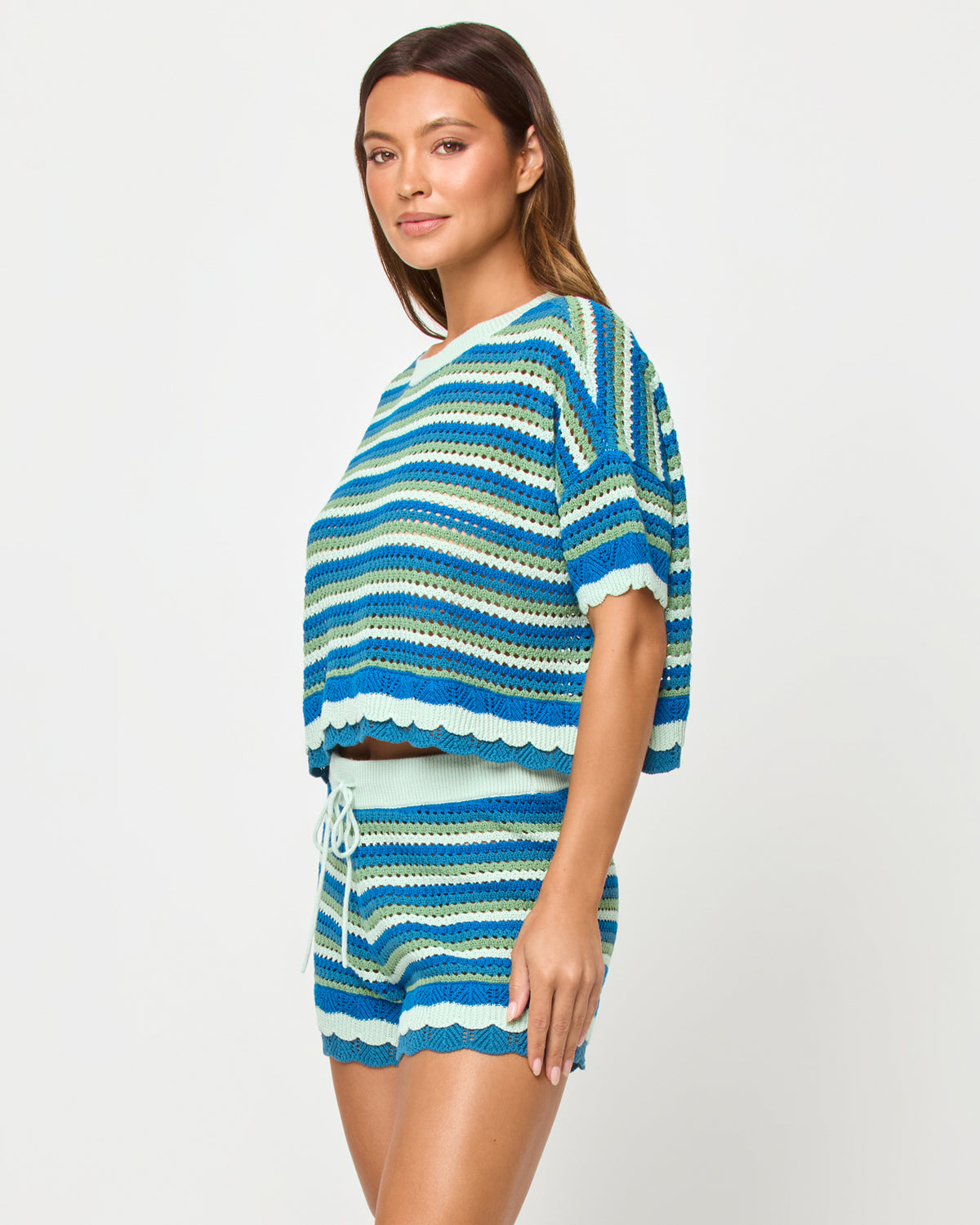 Seas The Day Top - Tropicoast Stripe LSPACE Seas The Day top in Tropicoast Stripe, side view on model.