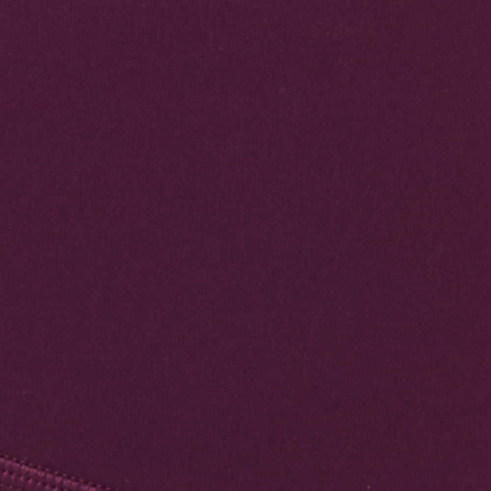 En Pointe Short - Plum Fabric swatch for the LSPACE En Pointe Short in plum, showing the plum color and fabric texture.