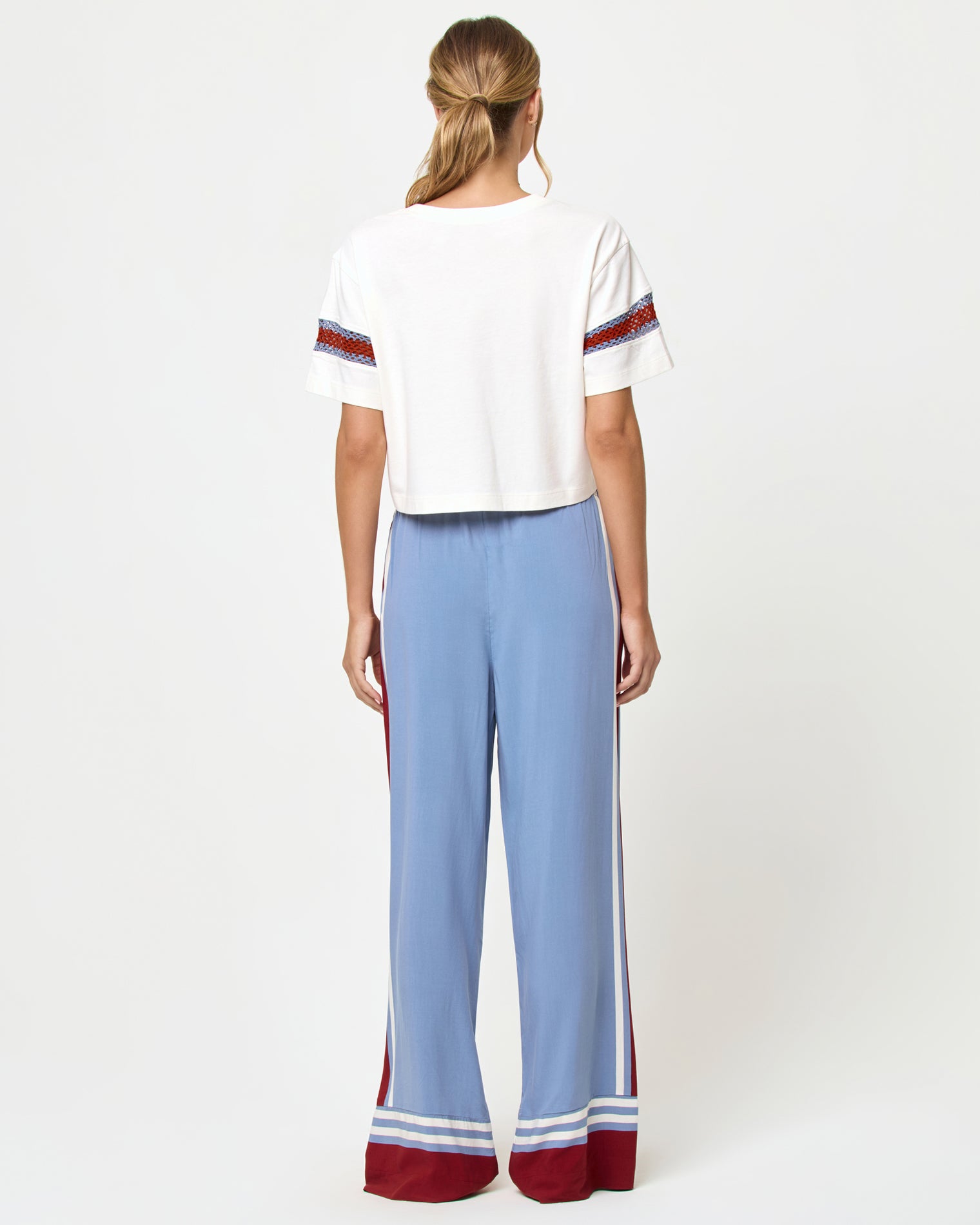 Unwind Pant - Unwind Stripe Back view of model wearing the LSPACE Unwind Pant in unwind stripe.