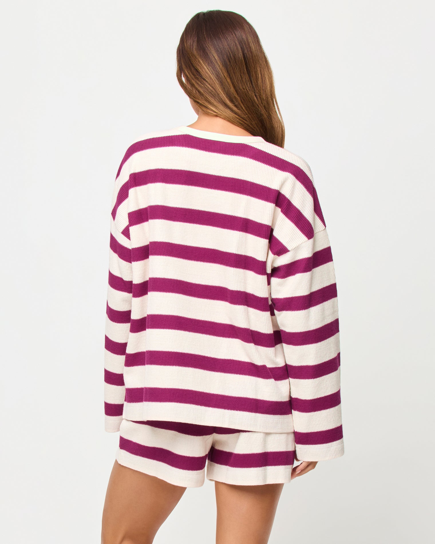 Maeve Top - Berry Jam Cream LSPACE Maeve top in Berry Jam Cream print, back view on model.