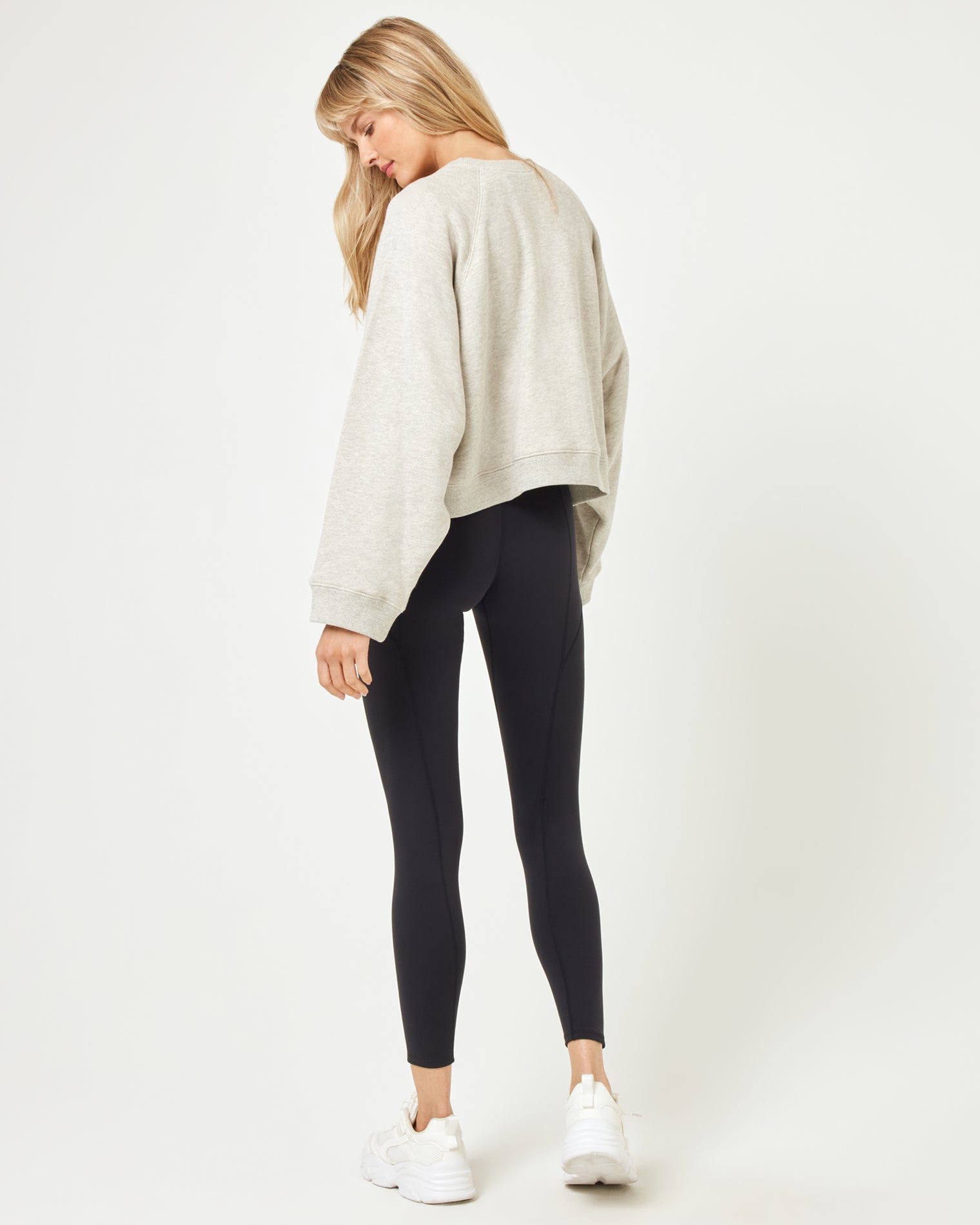 Vincent Pullover - Heather Grey Back view of model wearing the Vincent Pullover in heather grey with black shorts.