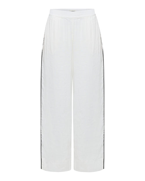 Off-model view of the LSPACE Sur Pant in Cream, a wide-leg pant in cream fabric with a black side stripe and elastic waistband.