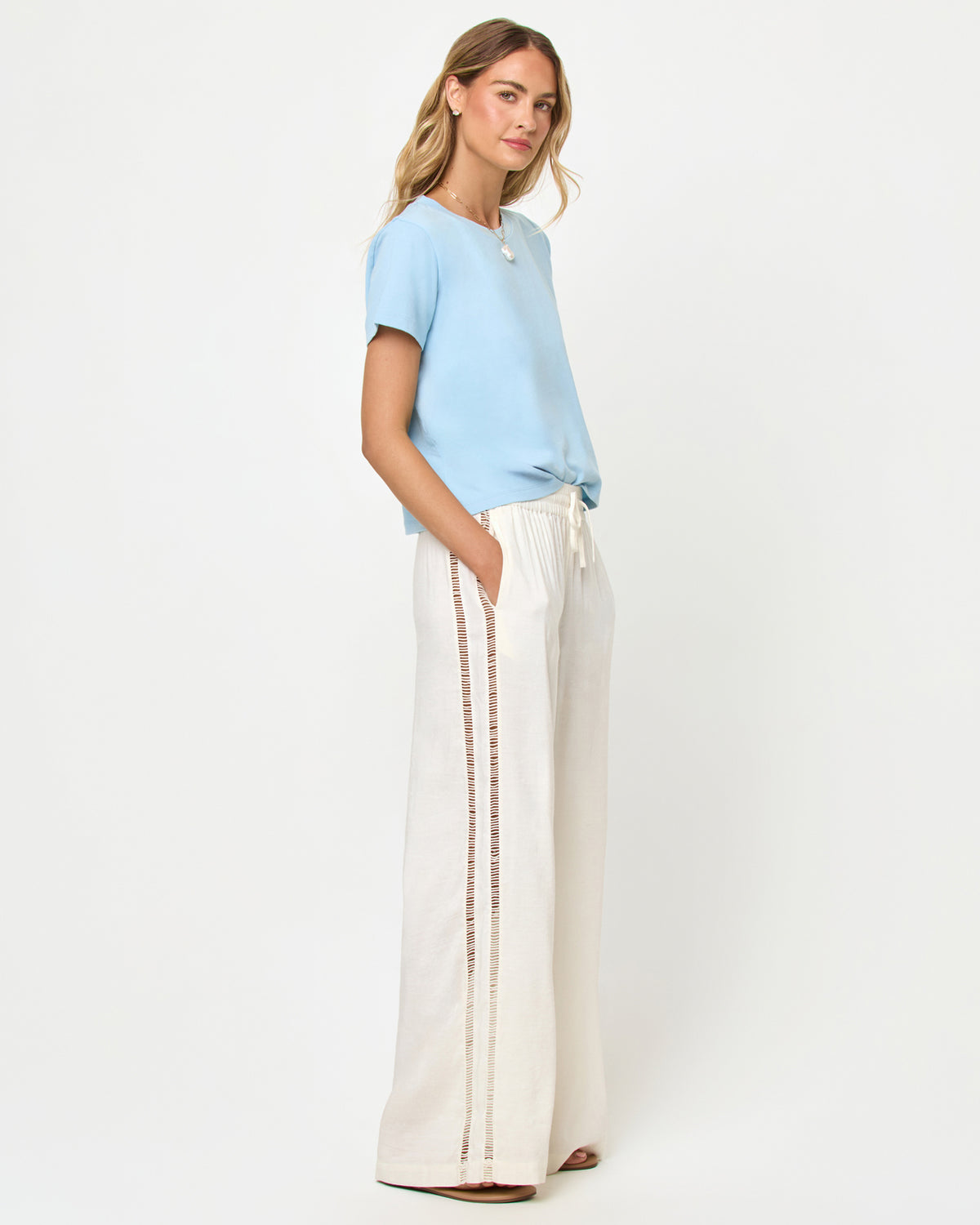 All Day Top - Sky Blue LSPACE All Day top in sky blue, side view on model.