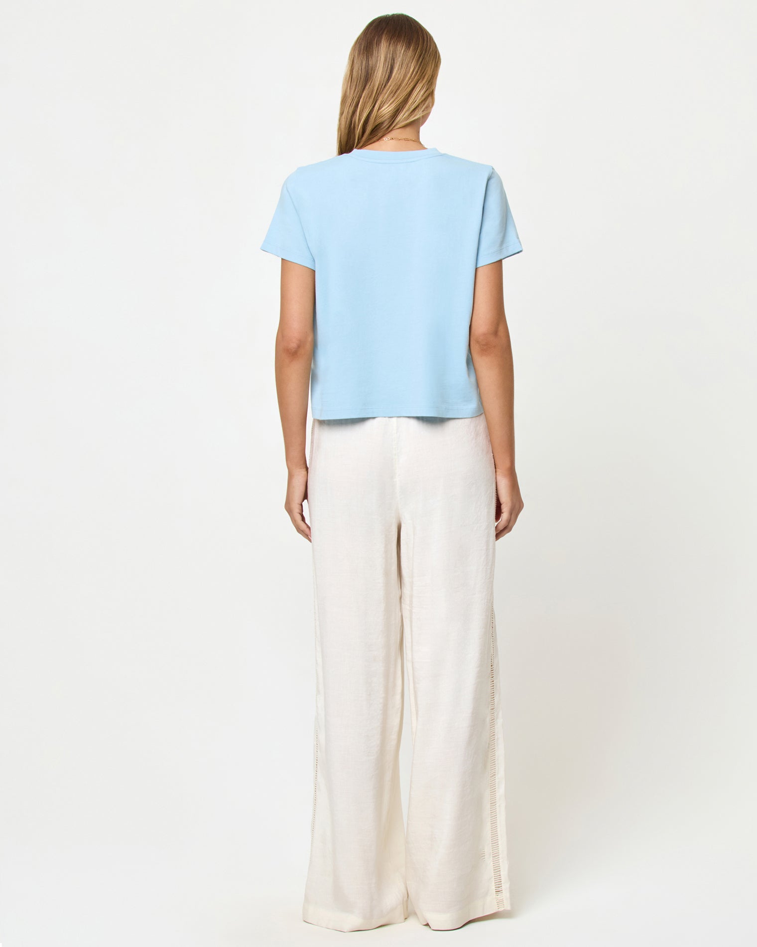 All Day Top - Sky Blue LSPACE All Day top in sky blue, back view on model.