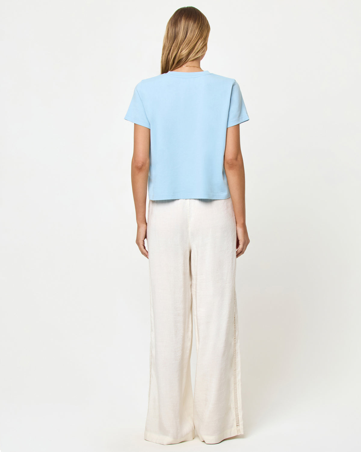 All Day Top - Sky Blue LSPACE All Day top in sky blue, back view on model.