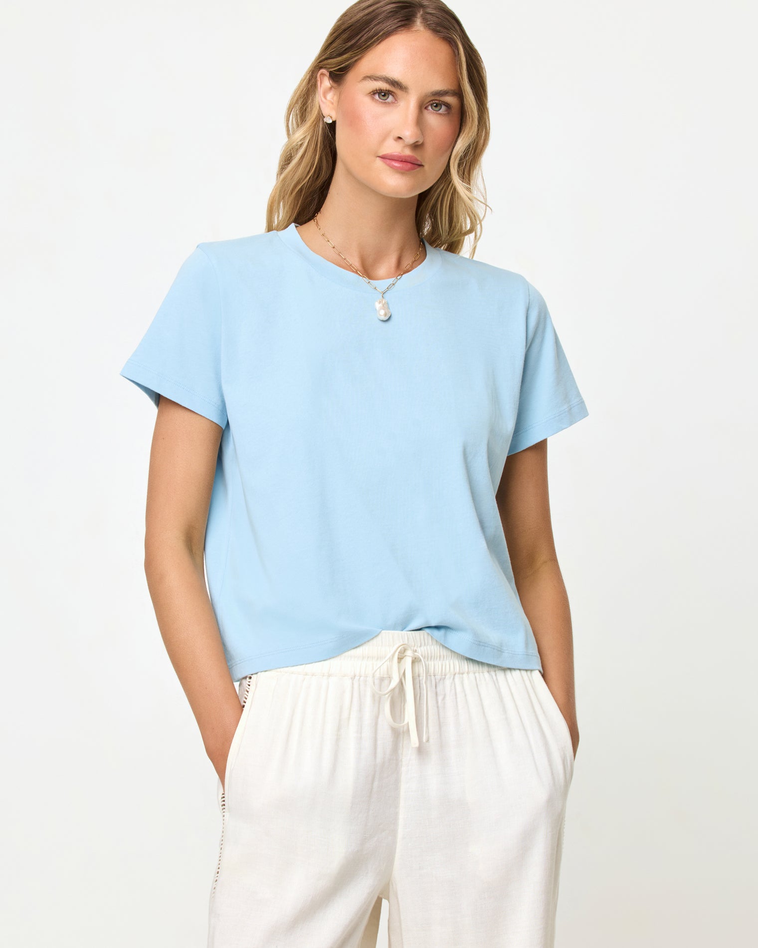 All Day Top - Sky Blue LSPACE All Day top in sky blue, close-up detail view on model.