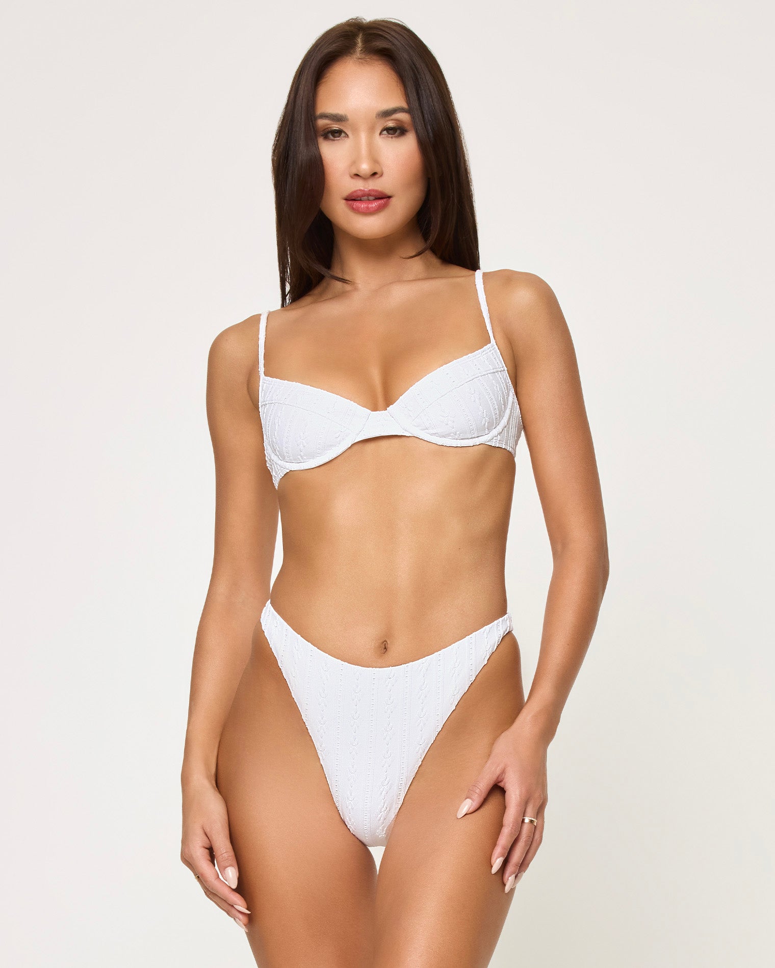 Missy Bikini Top - Eyelet White front view of woman wearing a white eyelet bikini against a white background