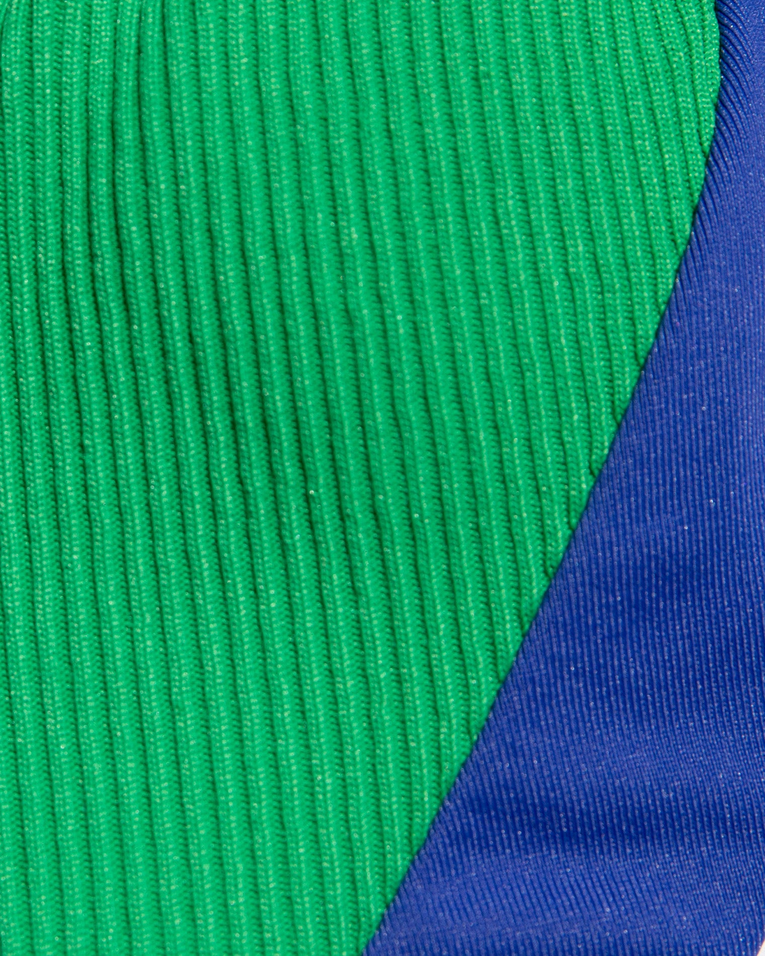 Daria Bikini Top - Clover Nebula Close-up of green and cobalt blue ribbed fabric.