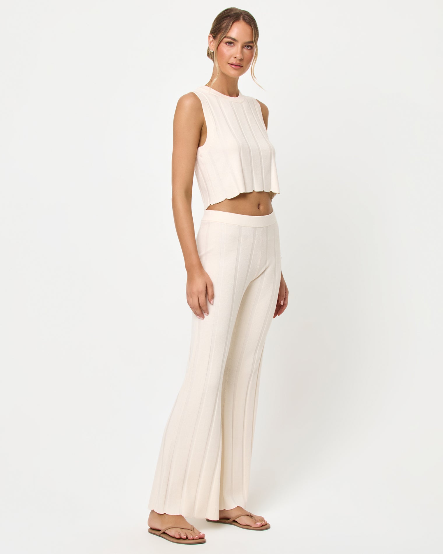 Iris Pant - Tapioca LSPACE Iris pant and En Route Top in tapioca, three-quarter view on model.